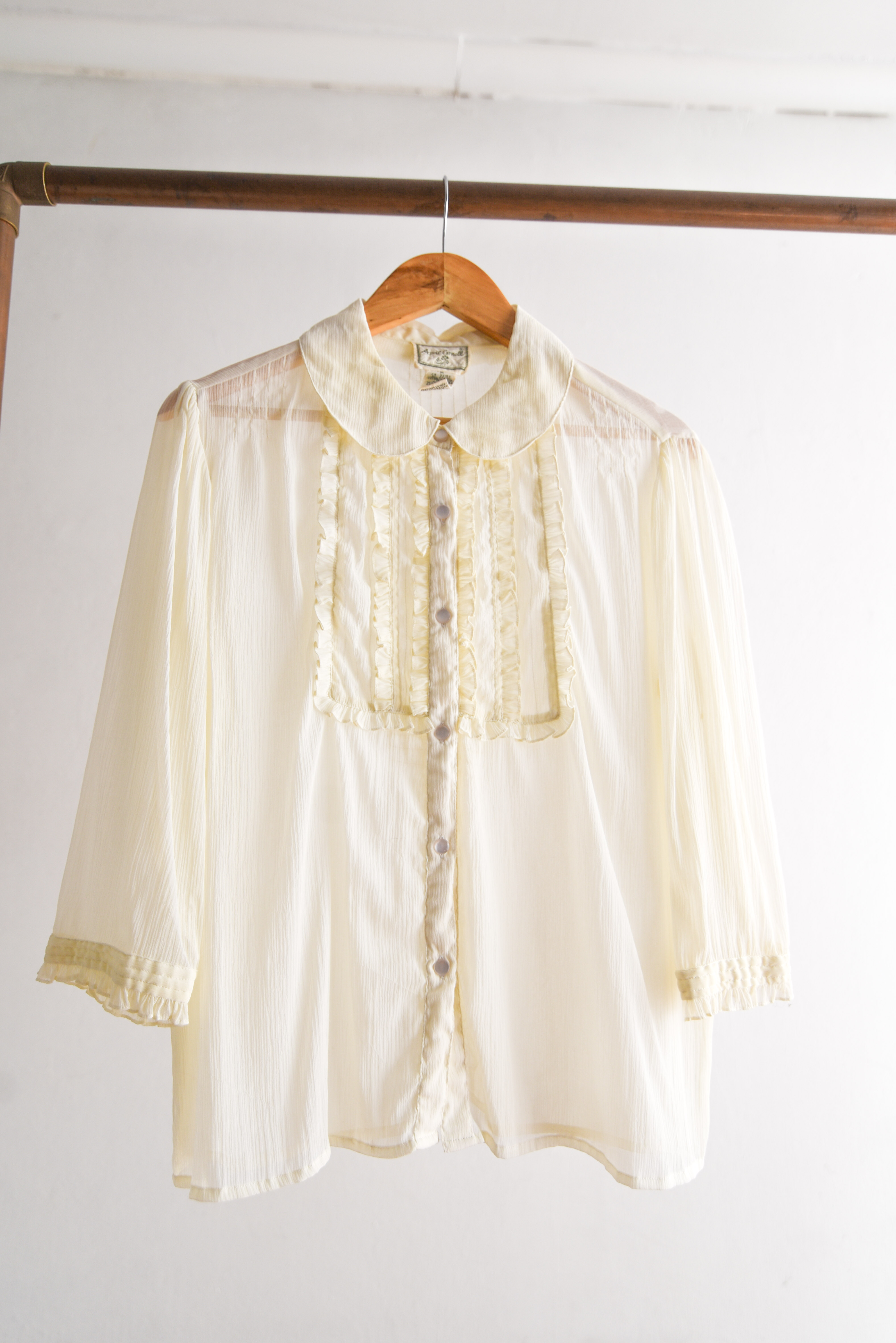 Blusa marfil transparencia cuellito