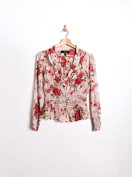 Blusa floreada romántica vuelos