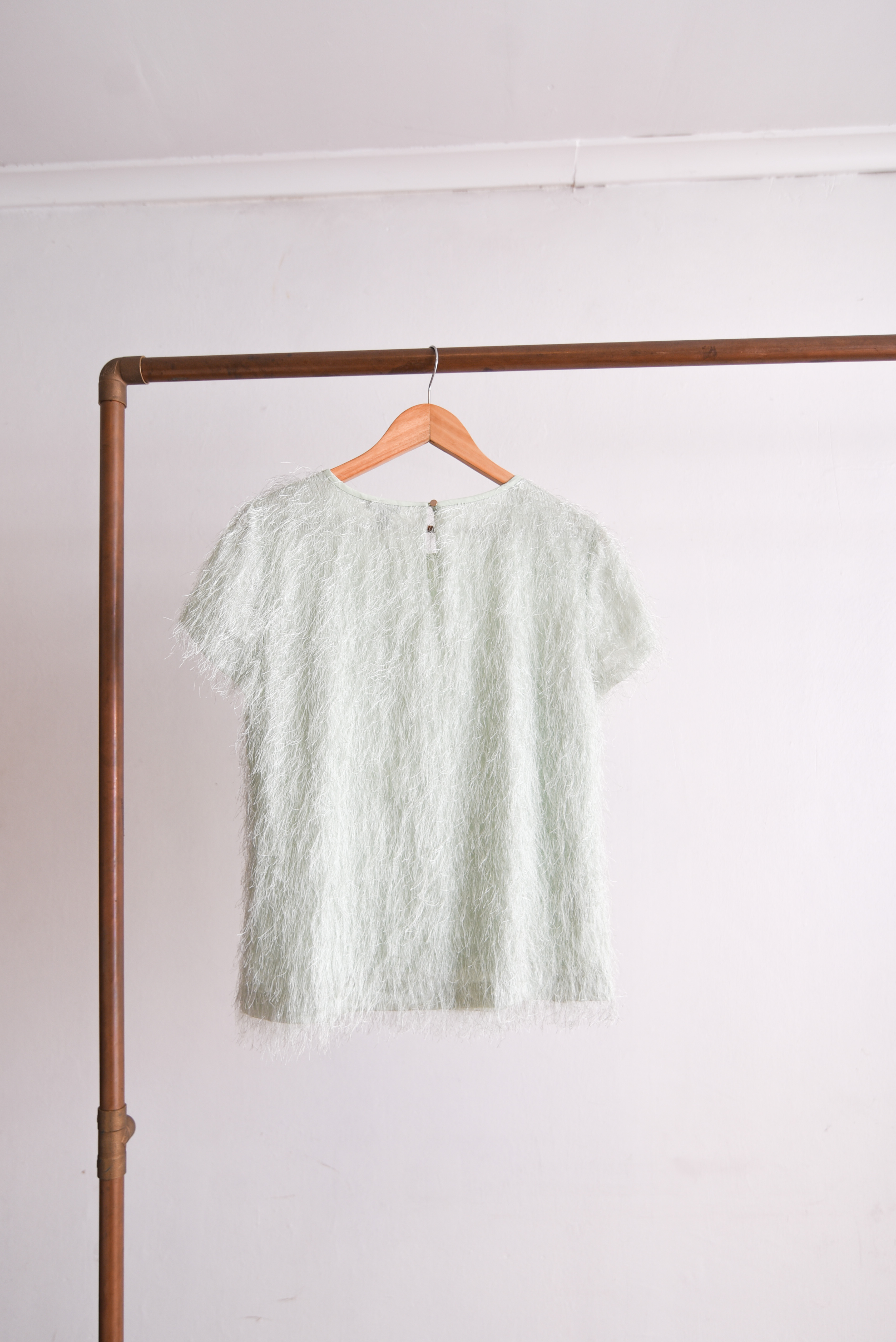 Top verde pastel furry