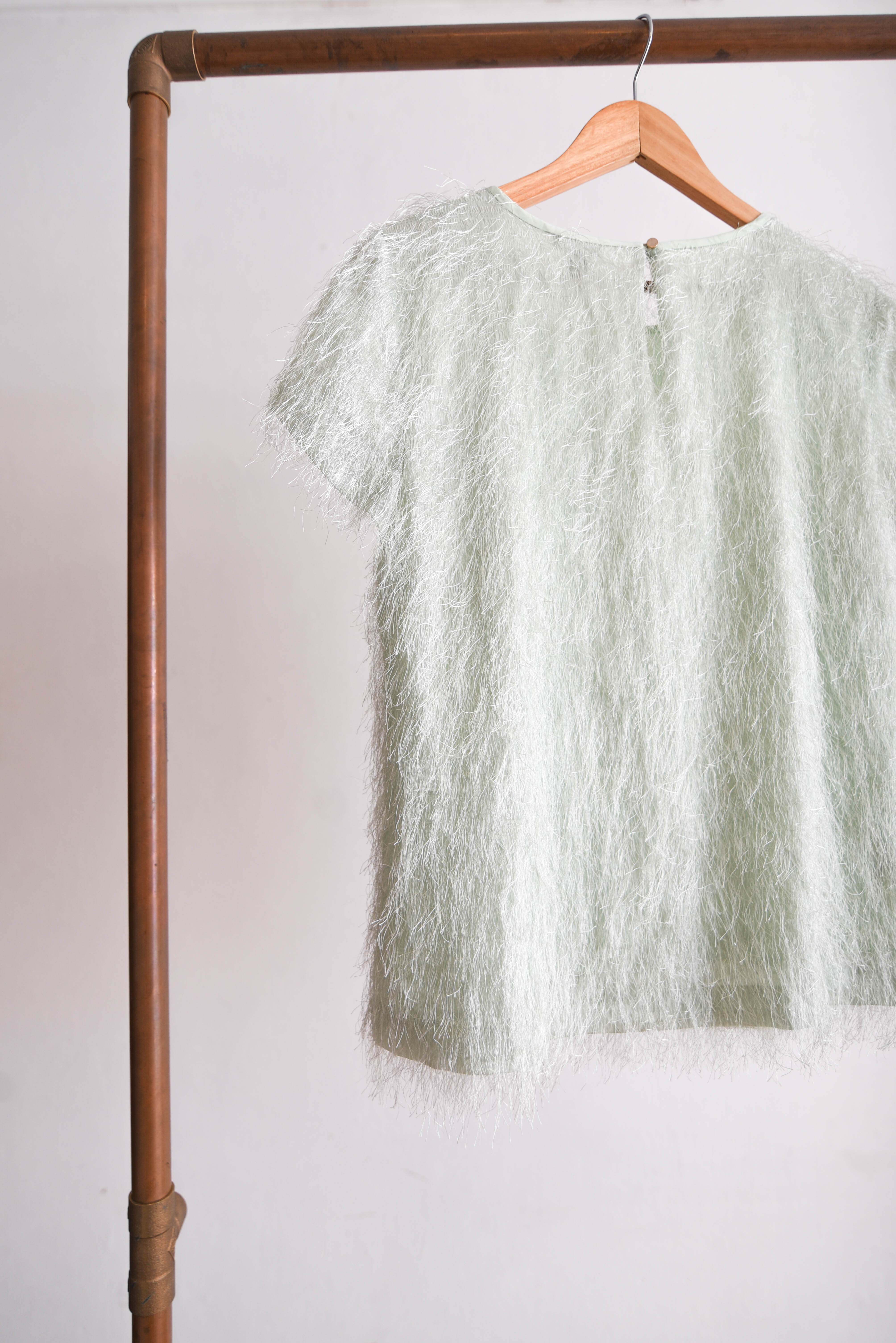 Top verde pastel furry