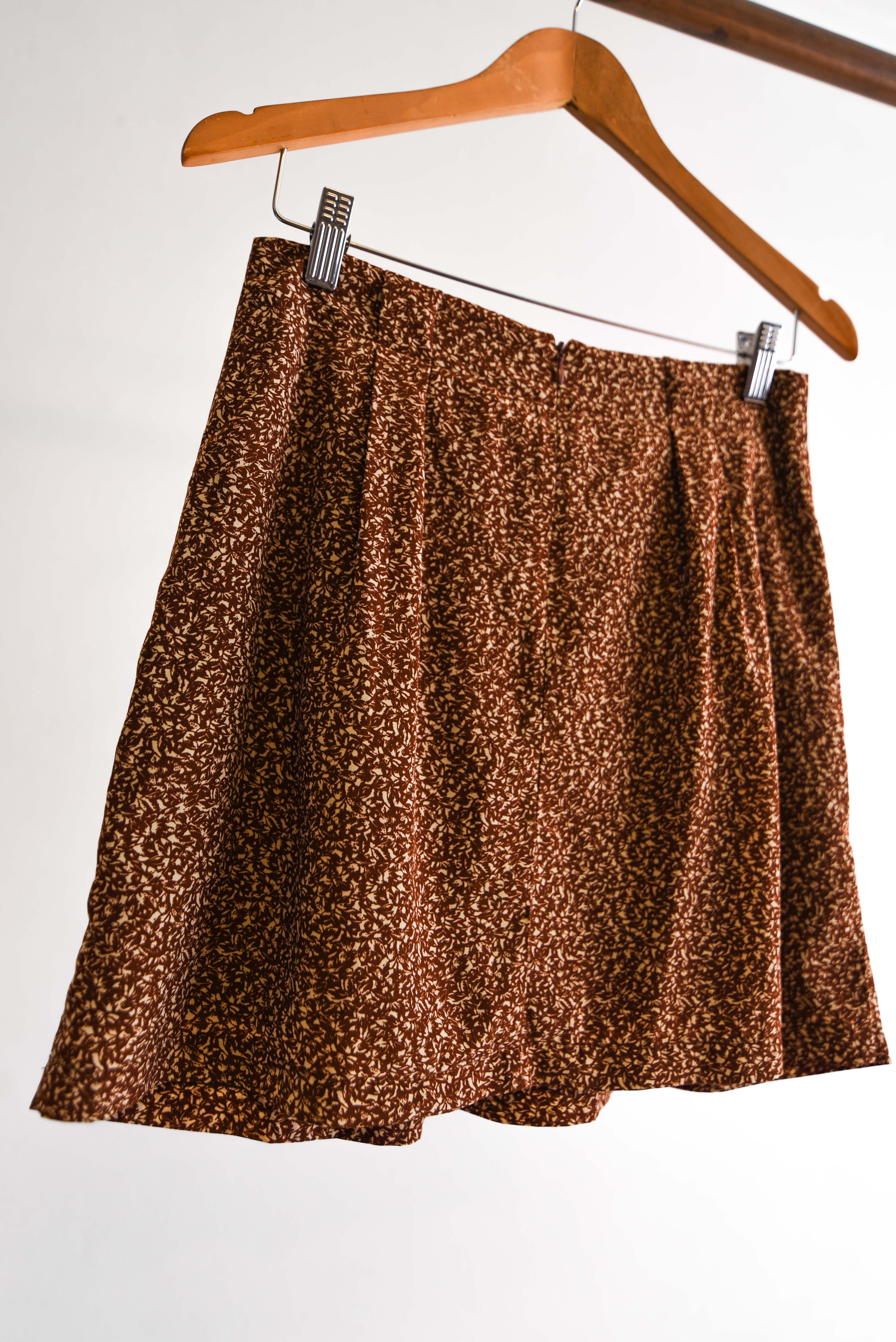 Falda café floral print