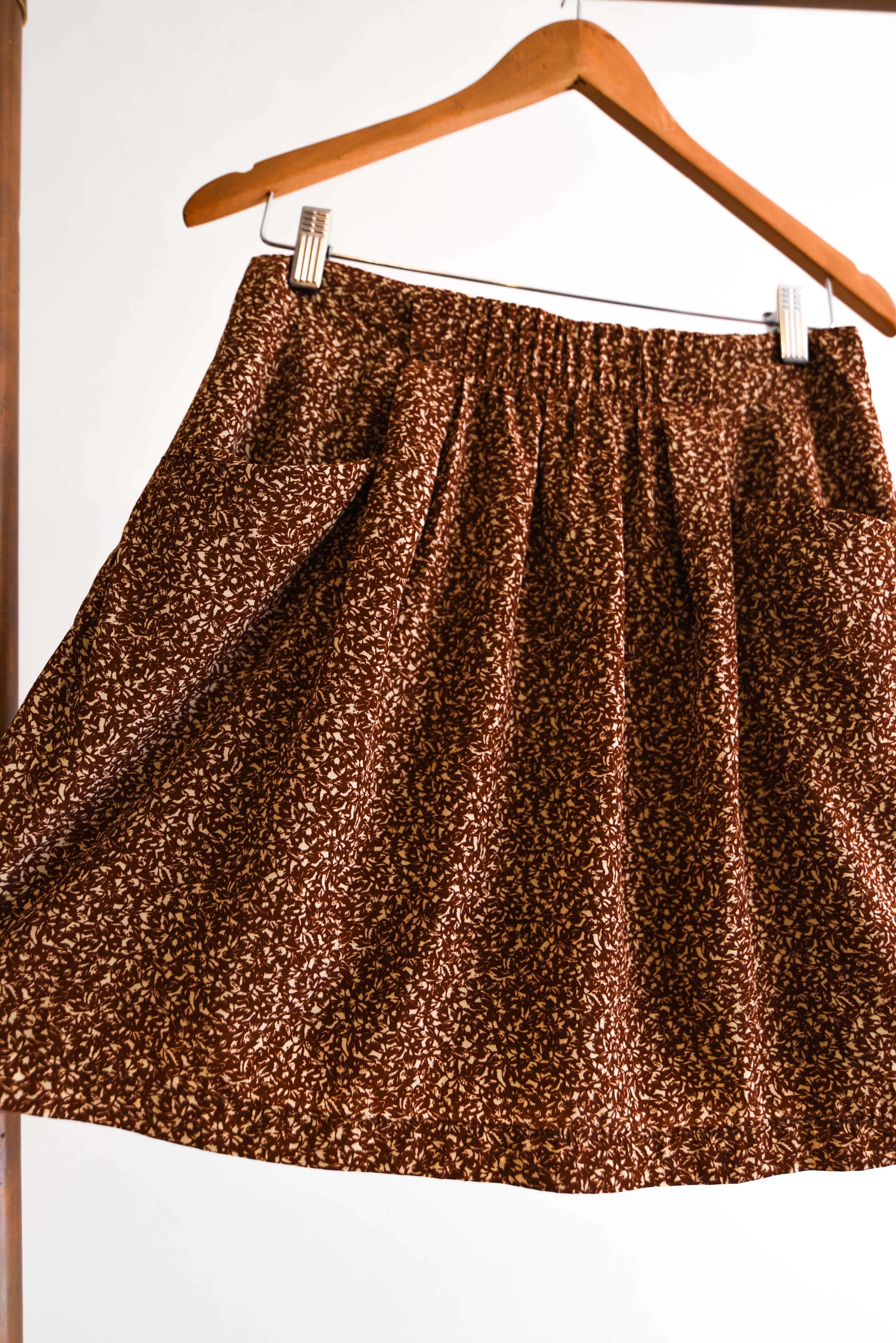 Falda café floral print