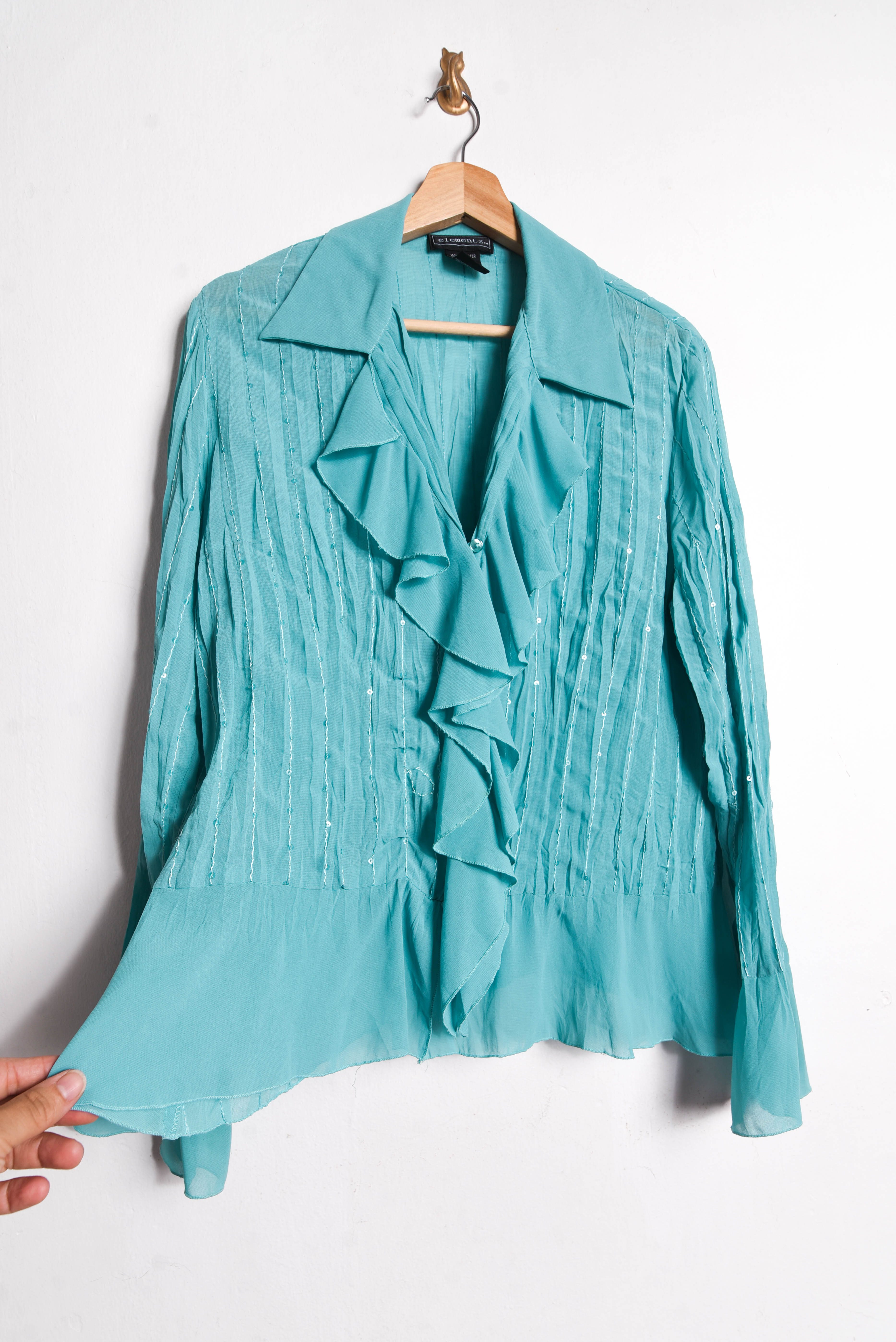 Blusa turquesa vuelos shiny