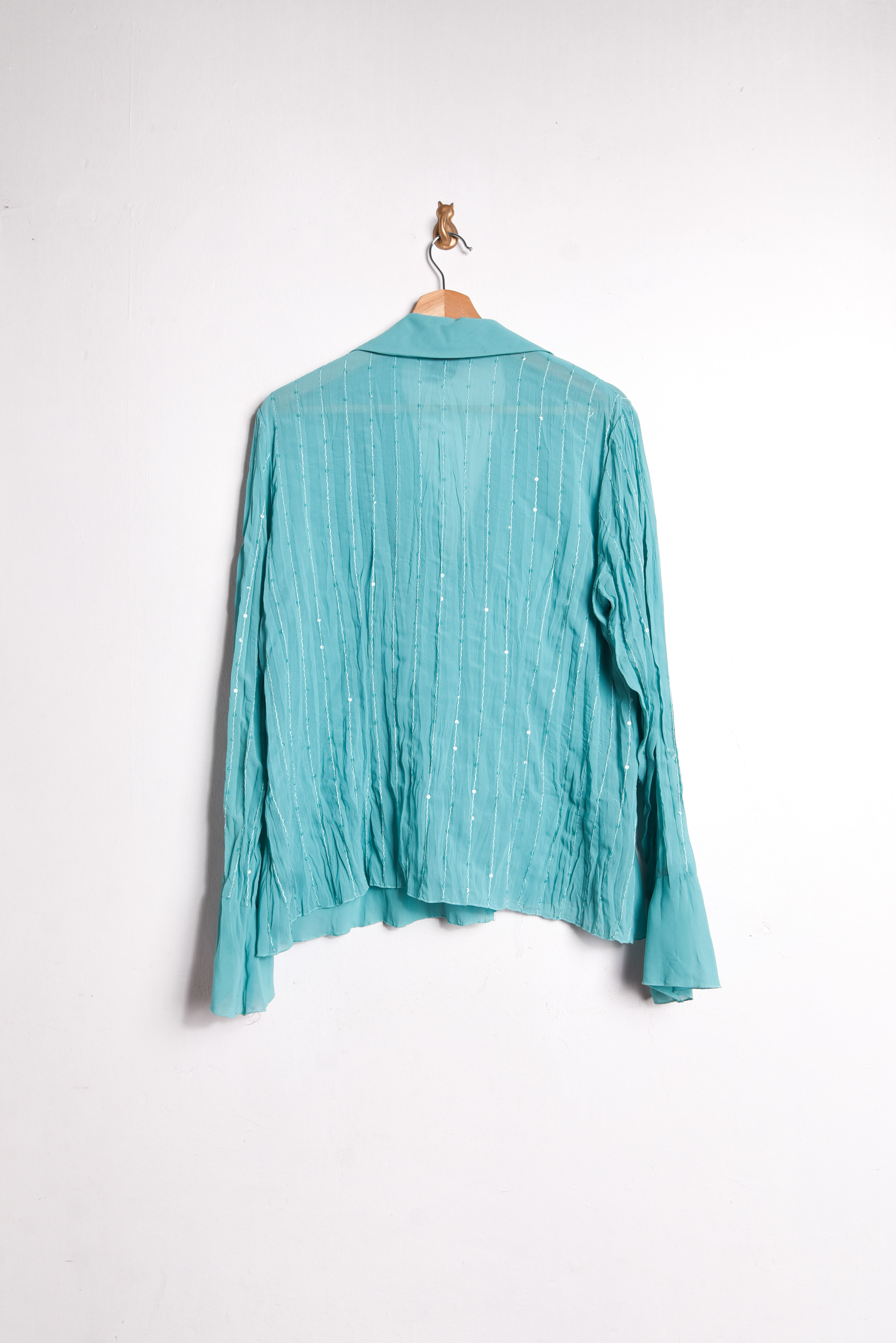 Blusa turquesa vuelos shiny