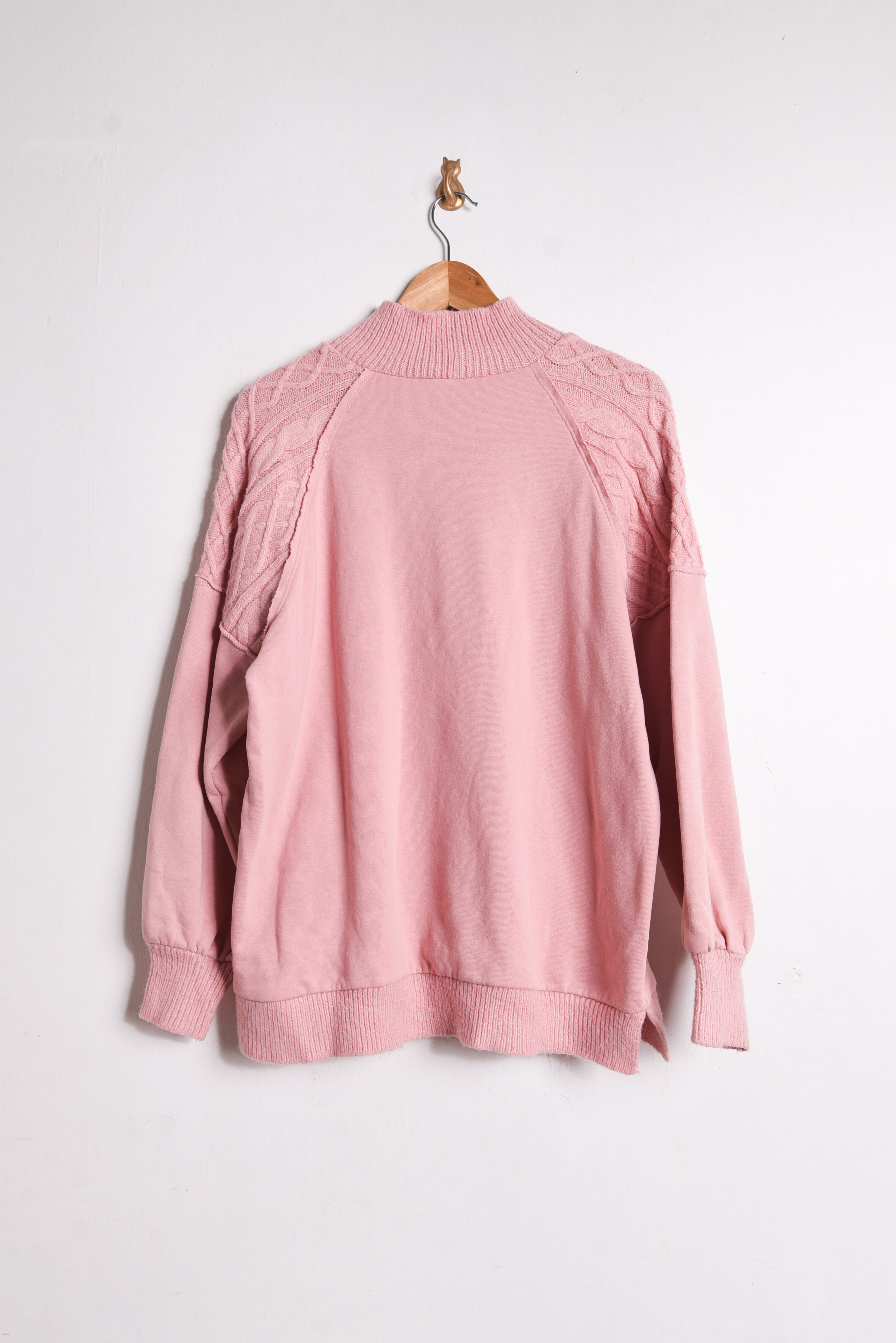 Polerón rosa palo cuello subido