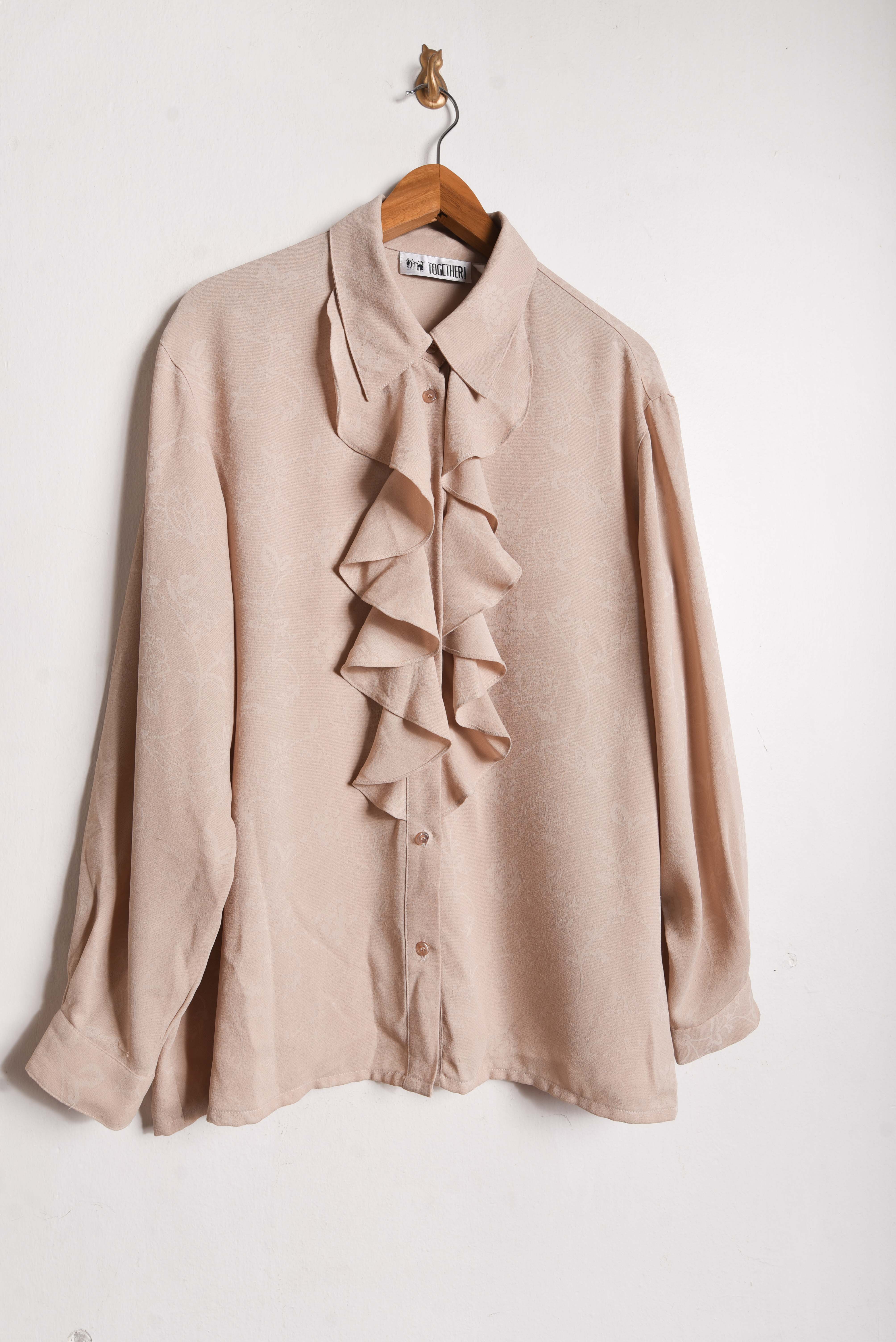 Blusa beige floral vuelos