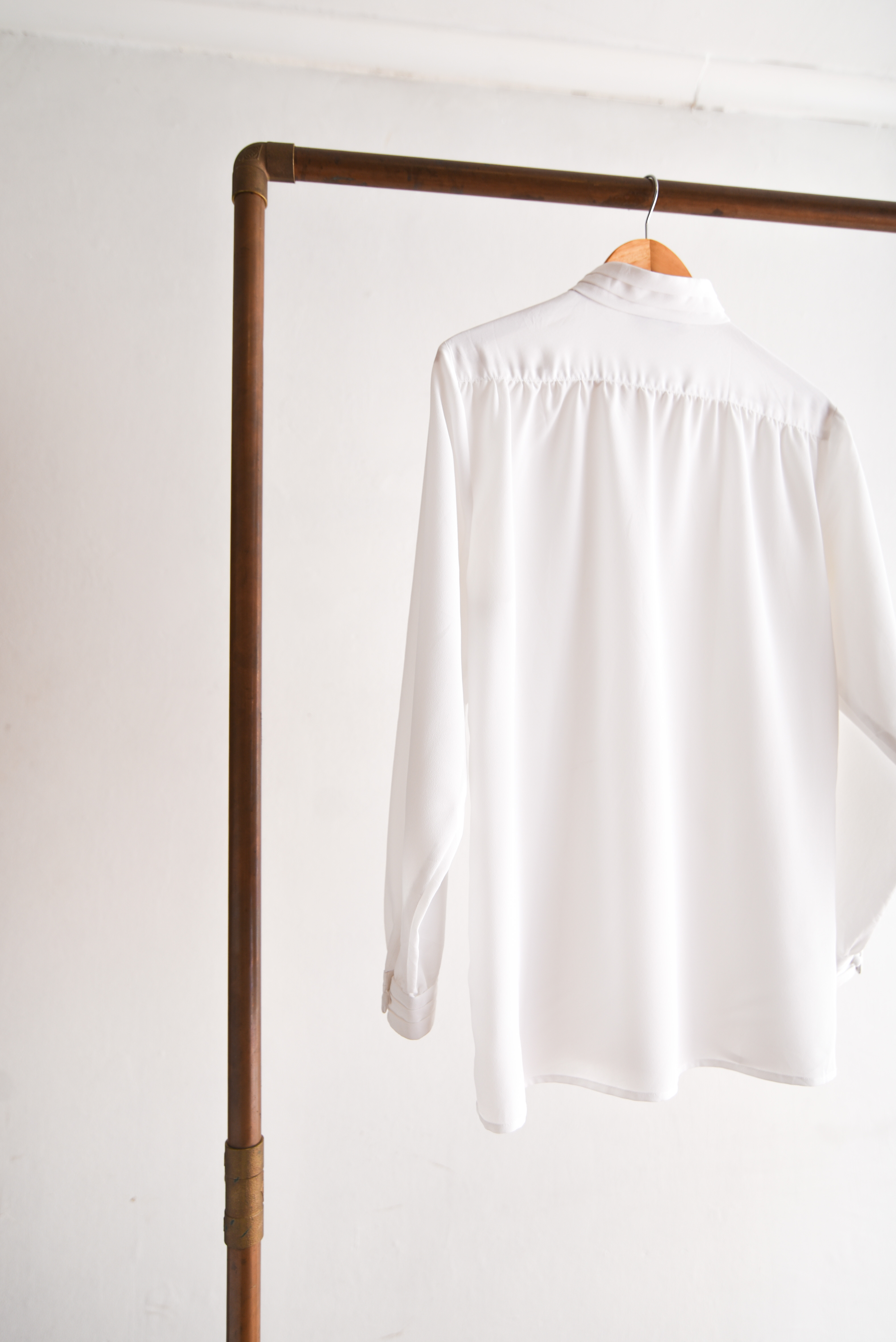 Blusa blanca plisada vintage