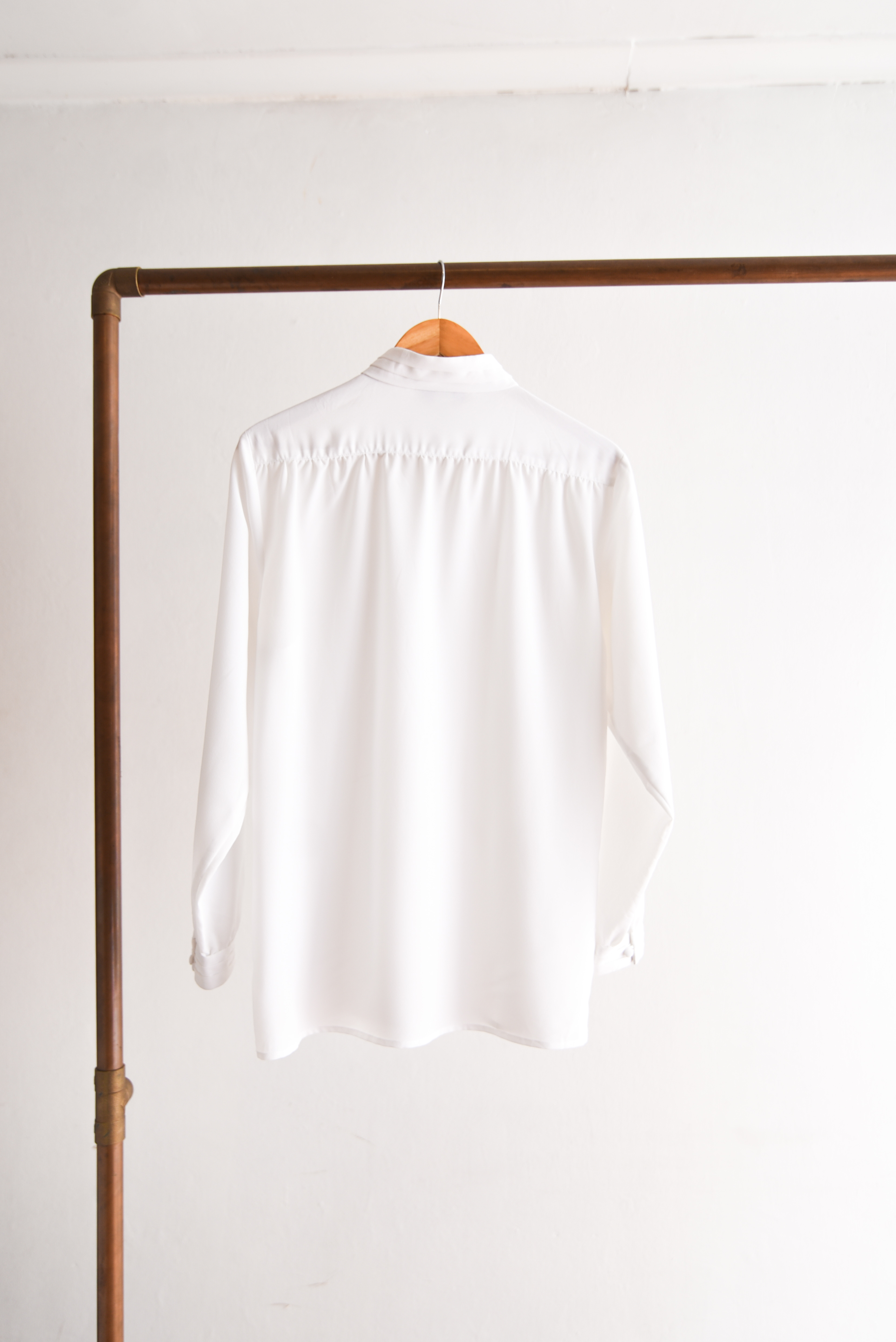 Blusa blanca plisada vintage