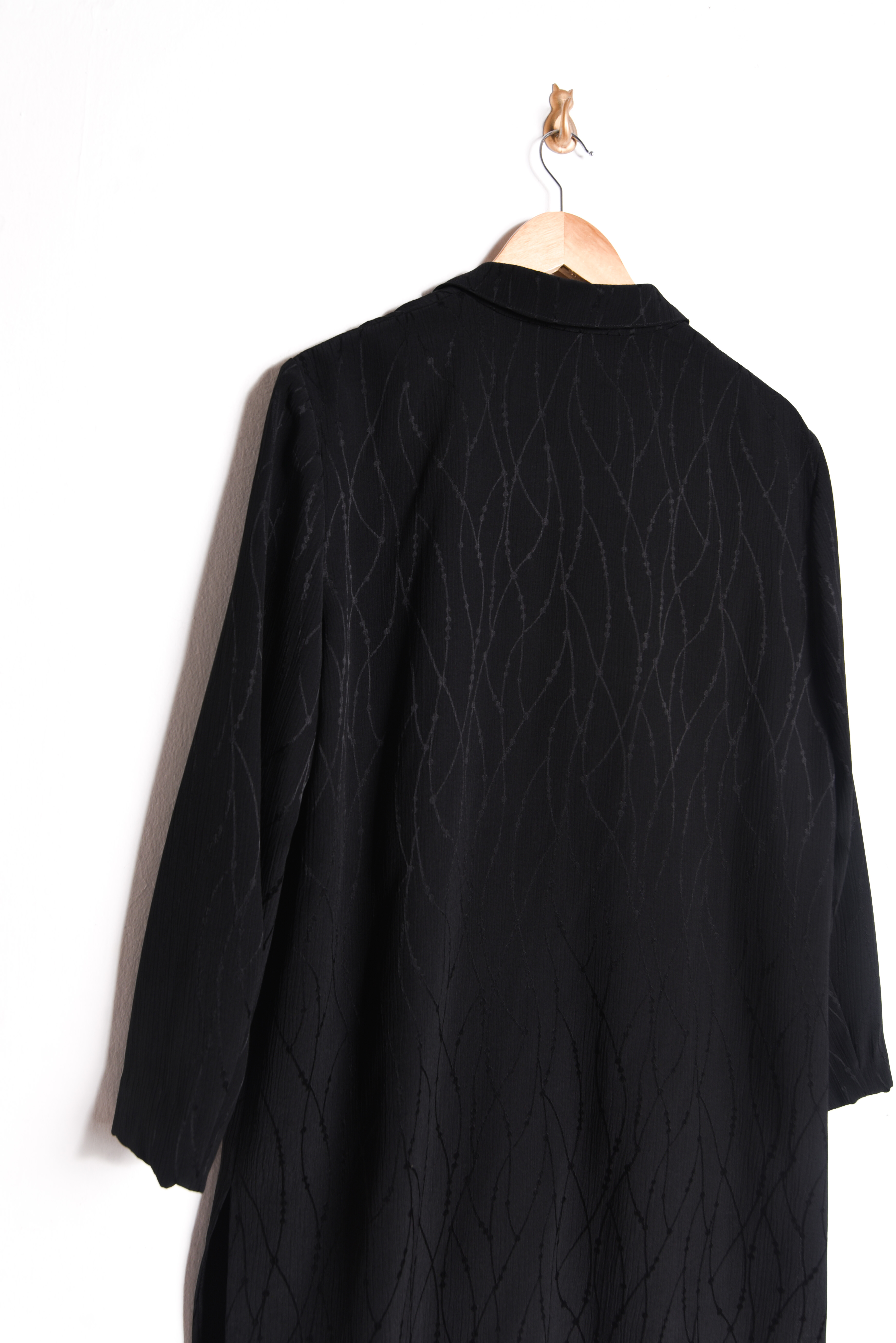 Blusón negro brocato