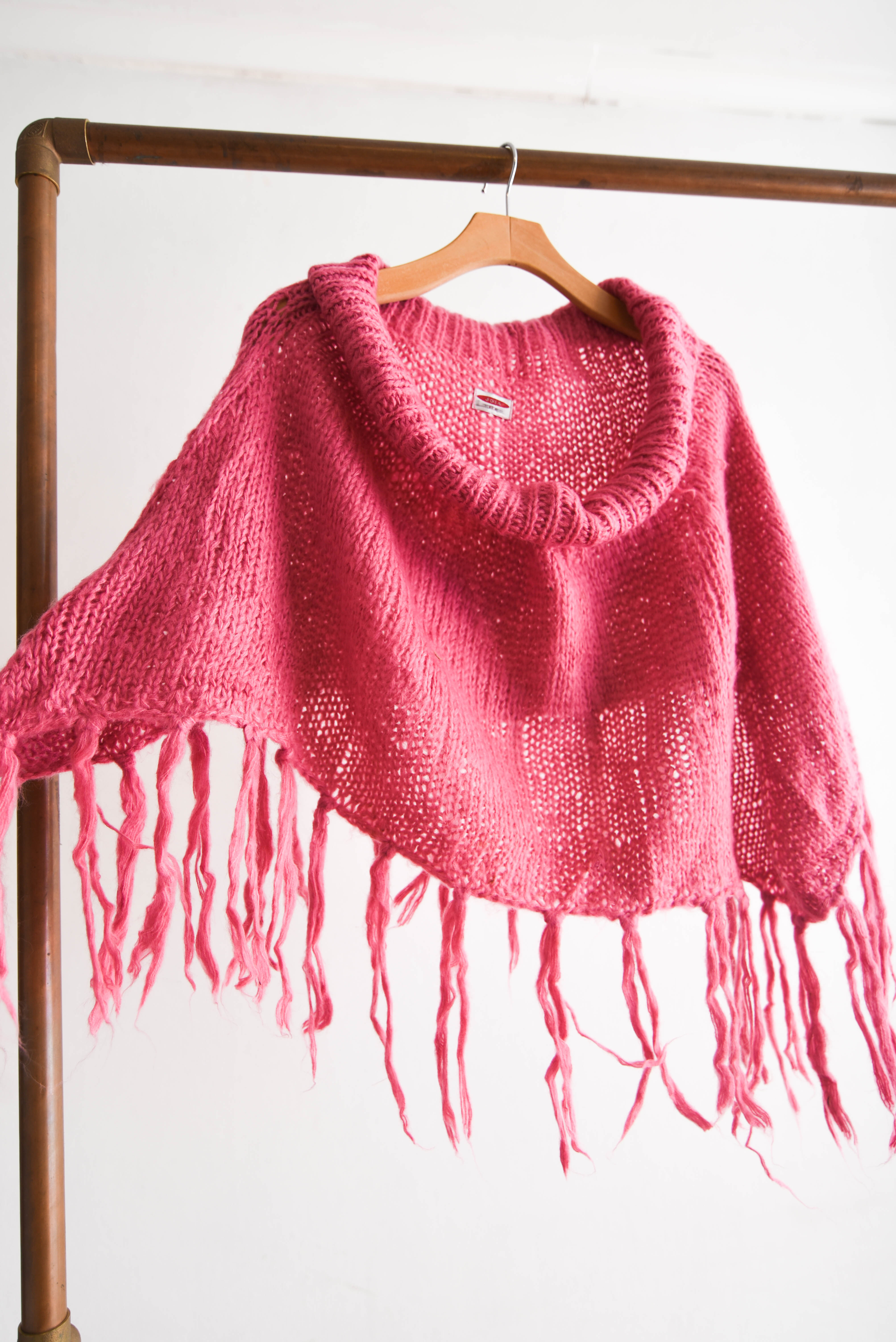 Poncho rosa flecos
