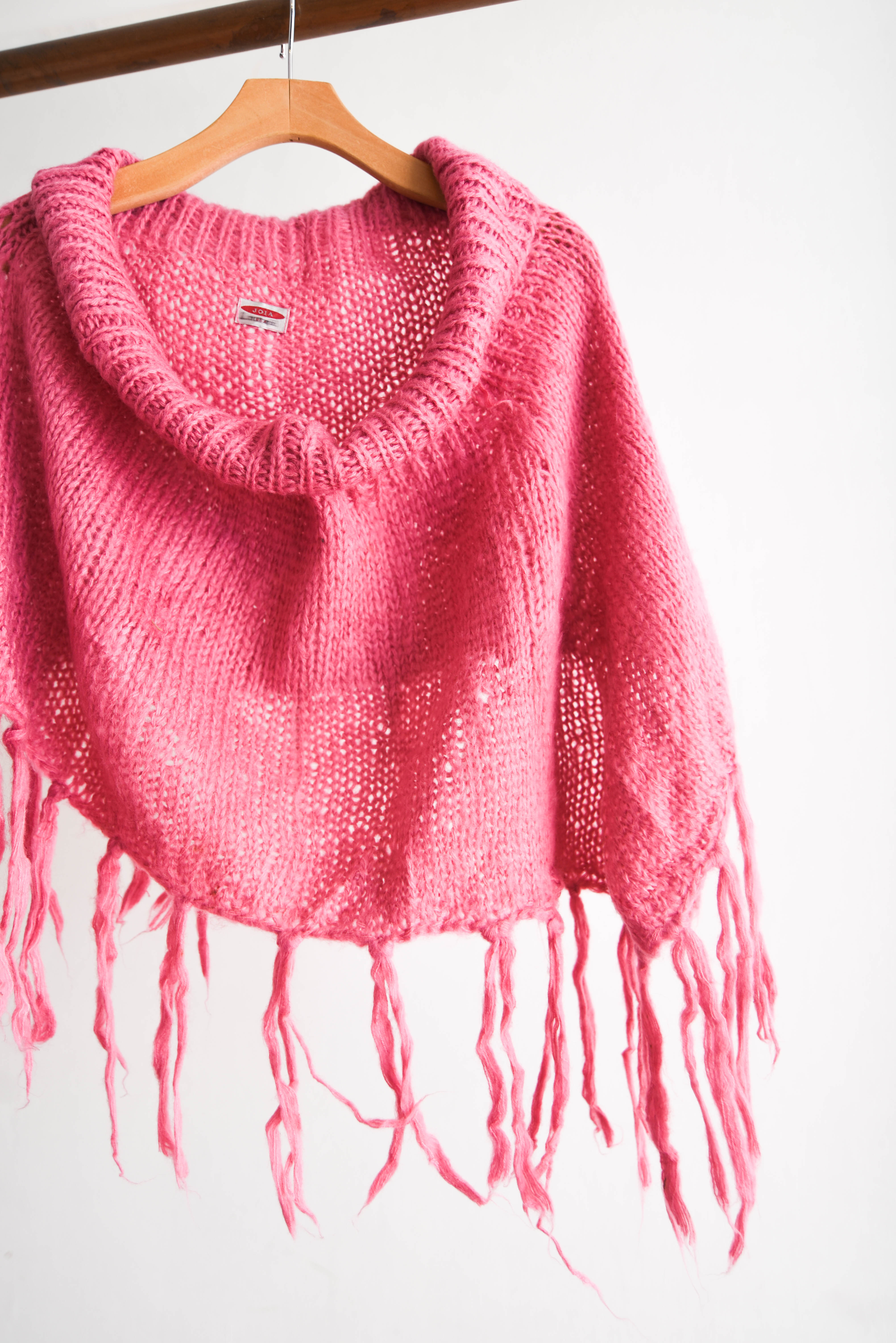 Poncho rosa flecos