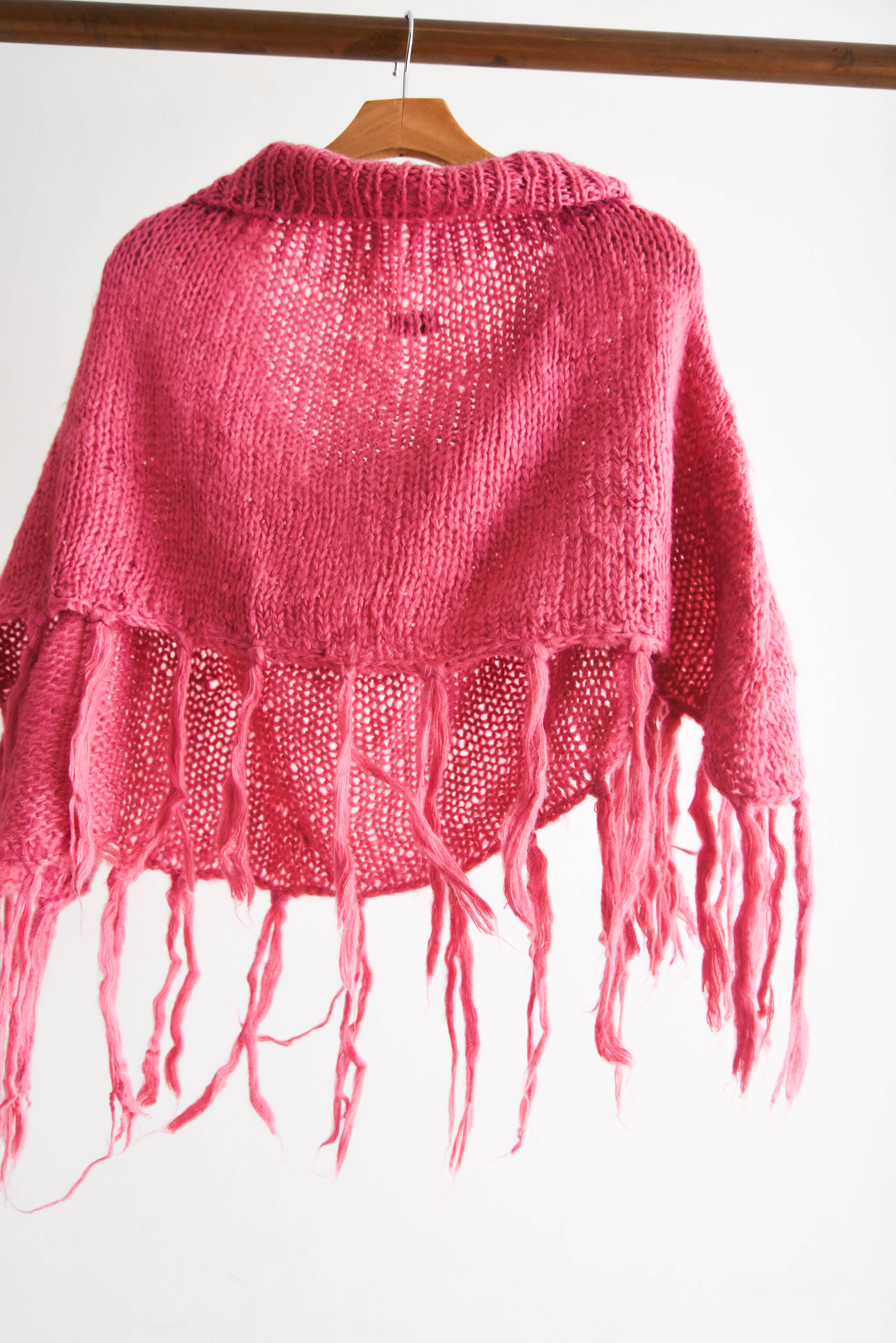 Poncho rosa flecos