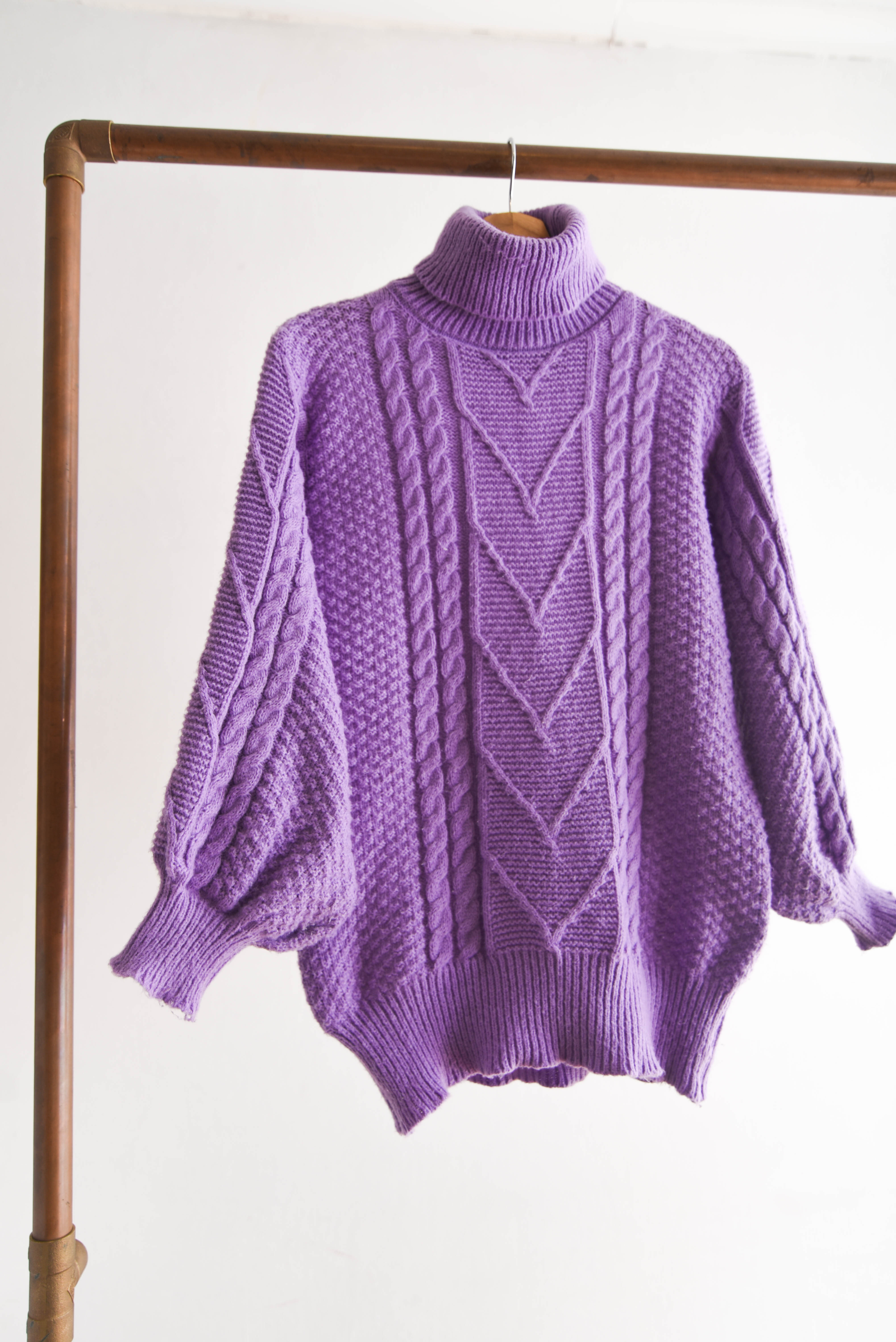 Chaleco lila globo trenzado