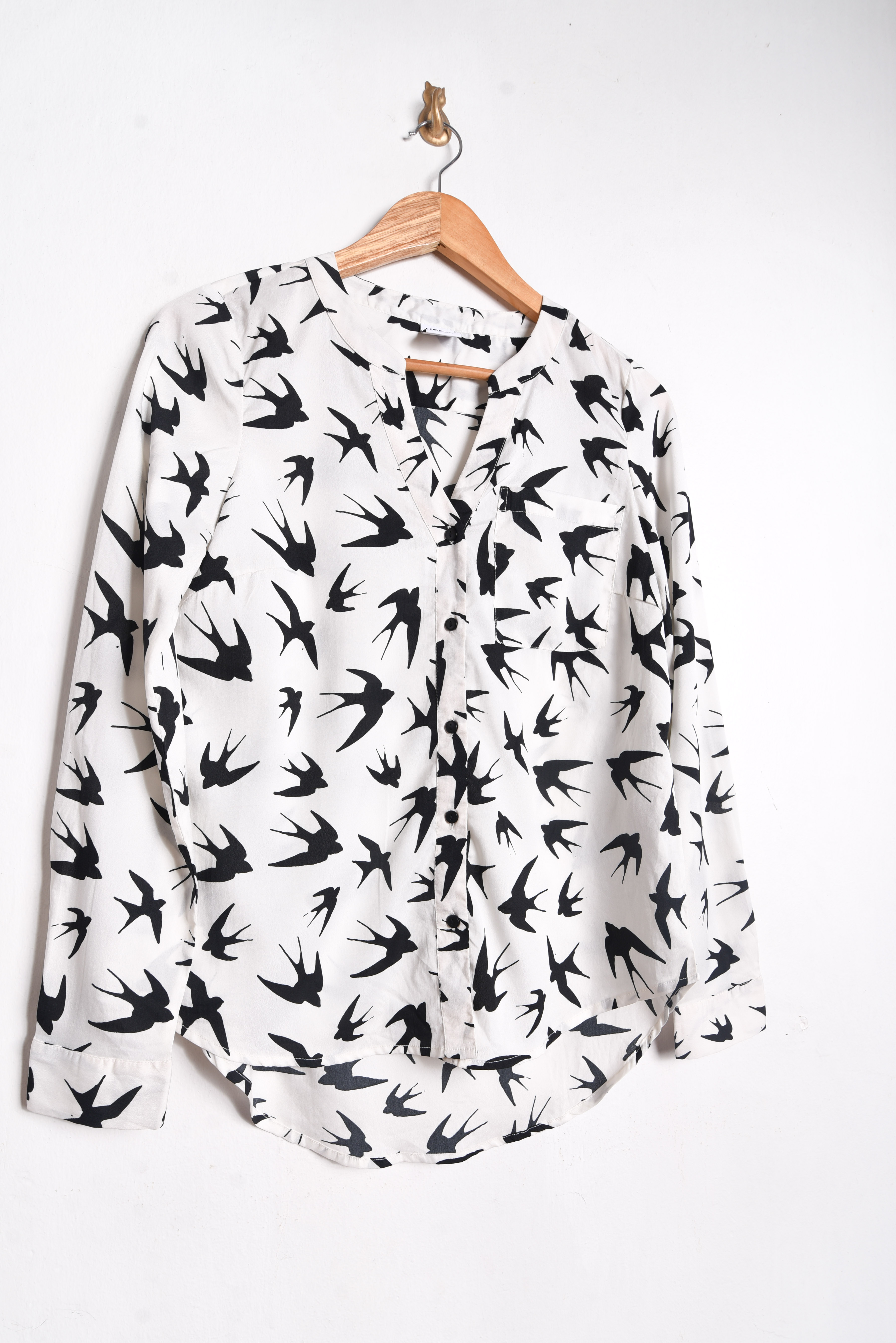 Blusa blanca golondrinas