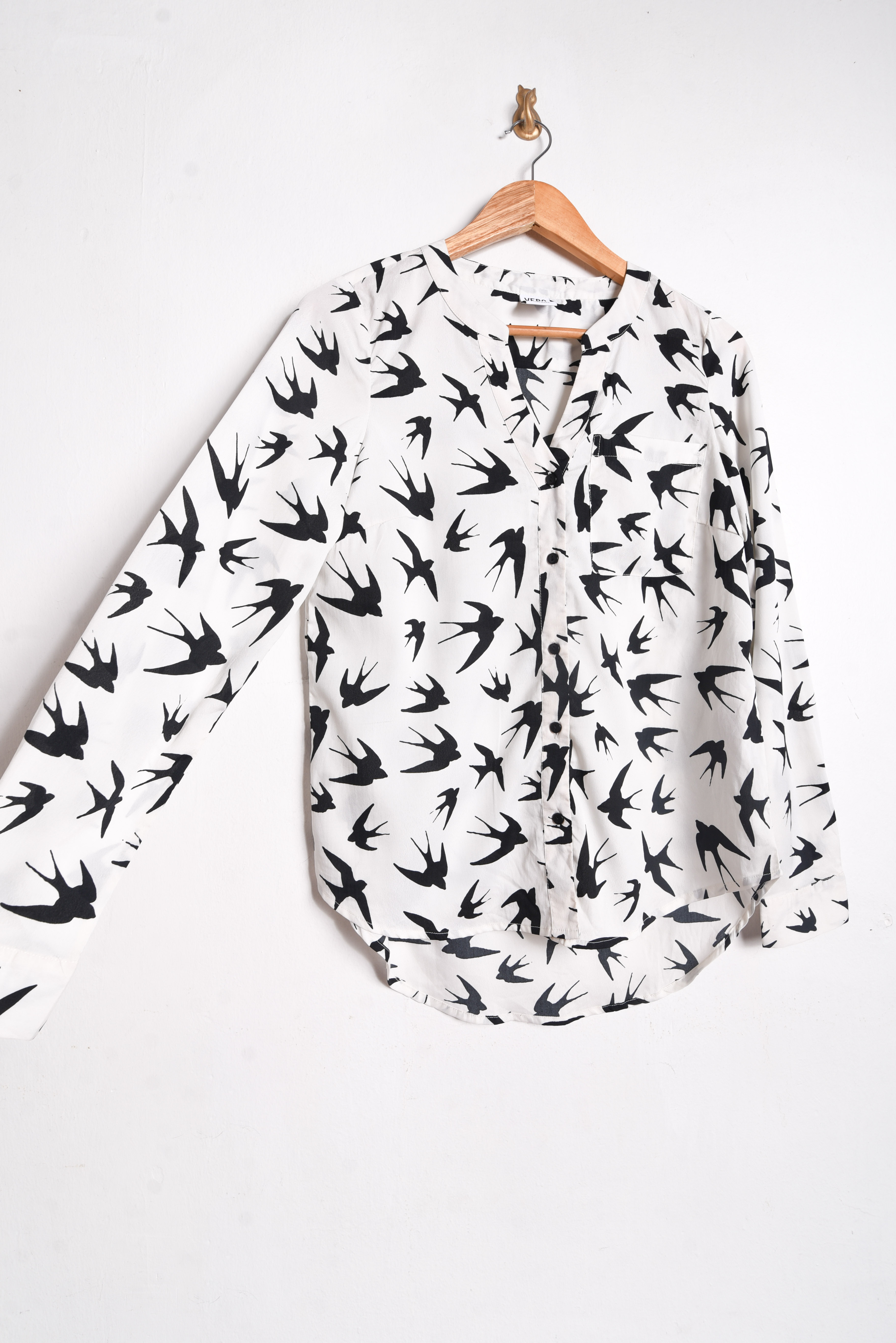 Blusa blanca golondrinas