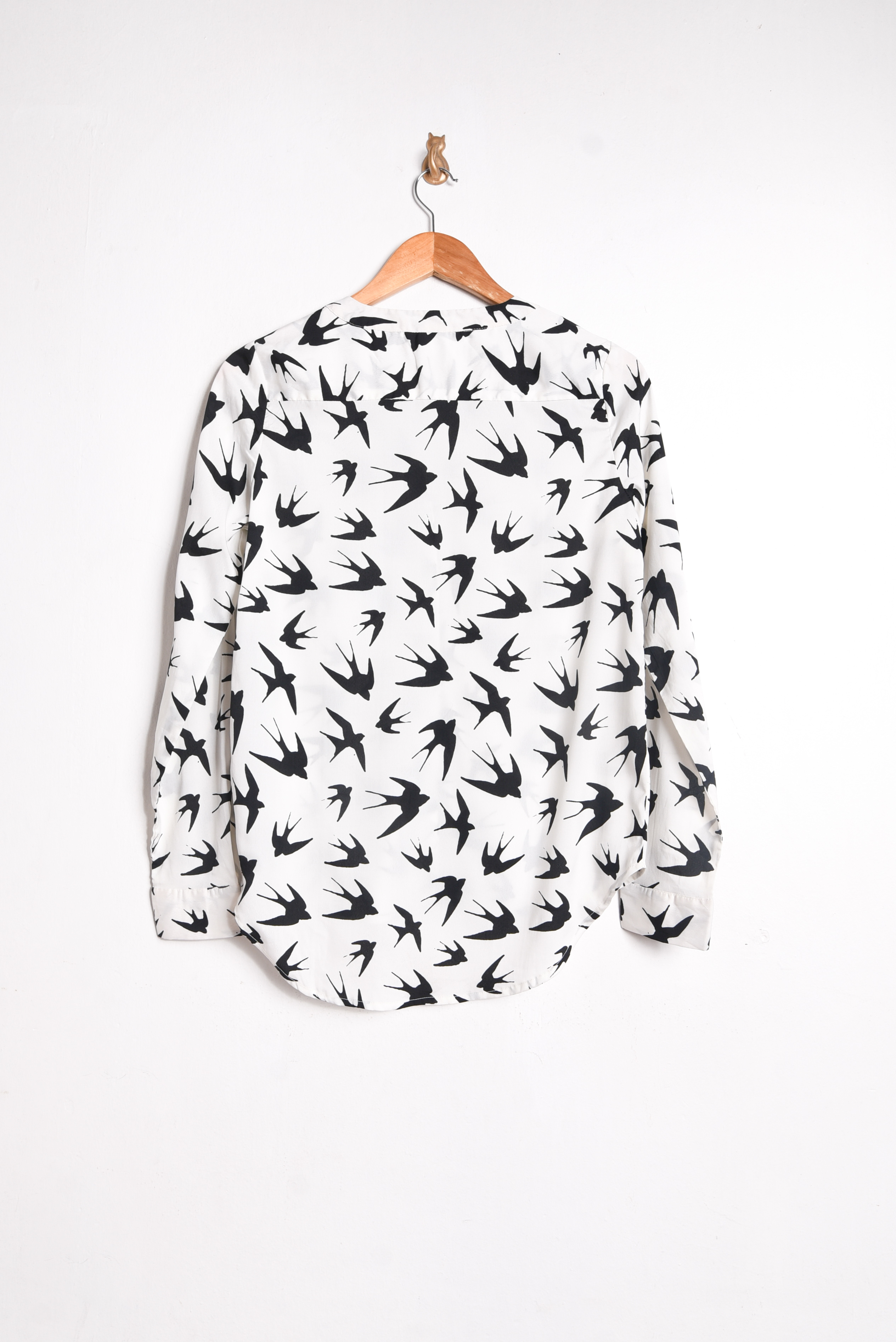 Blusa blanca golondrinas