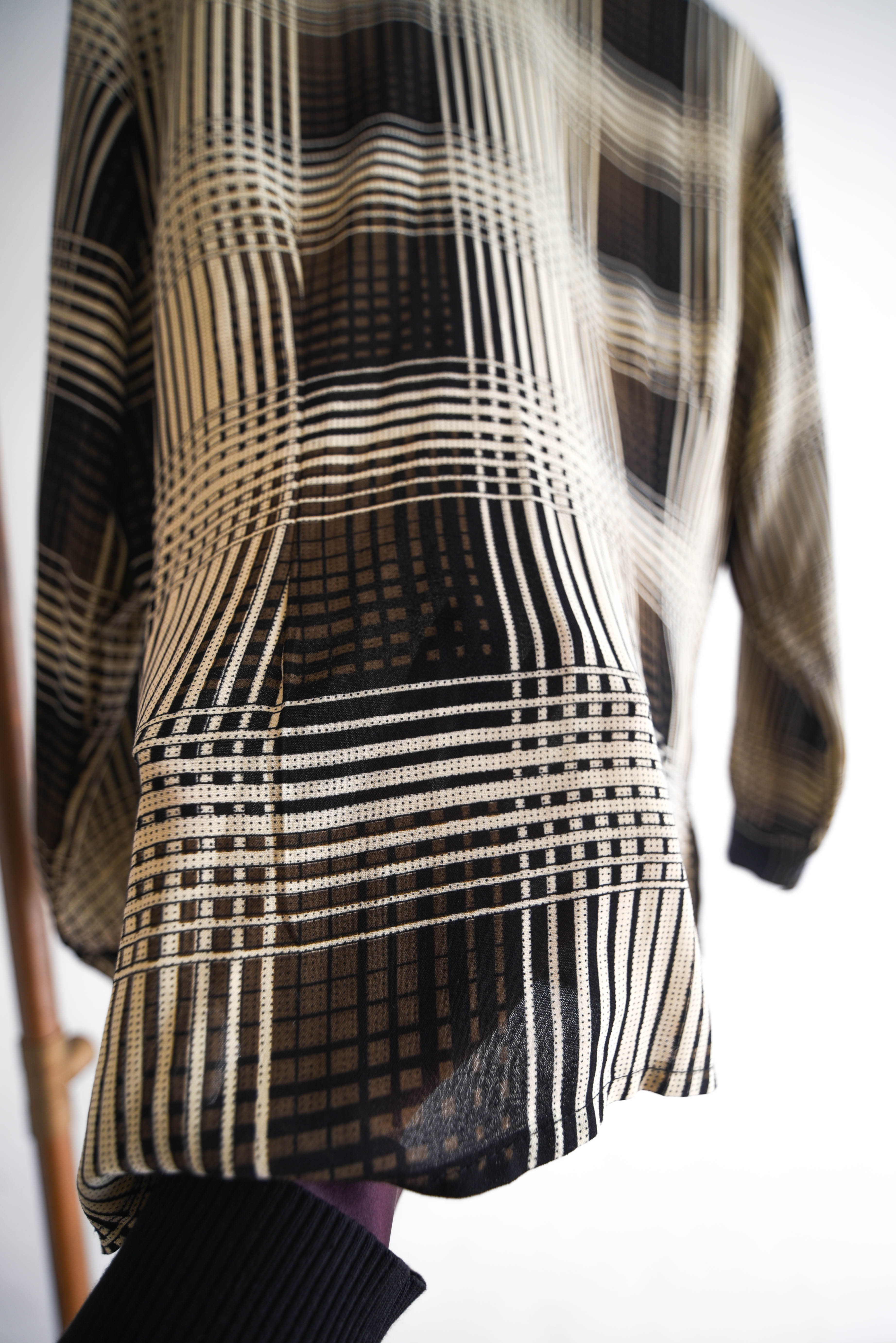 Blusa tartán café y negro