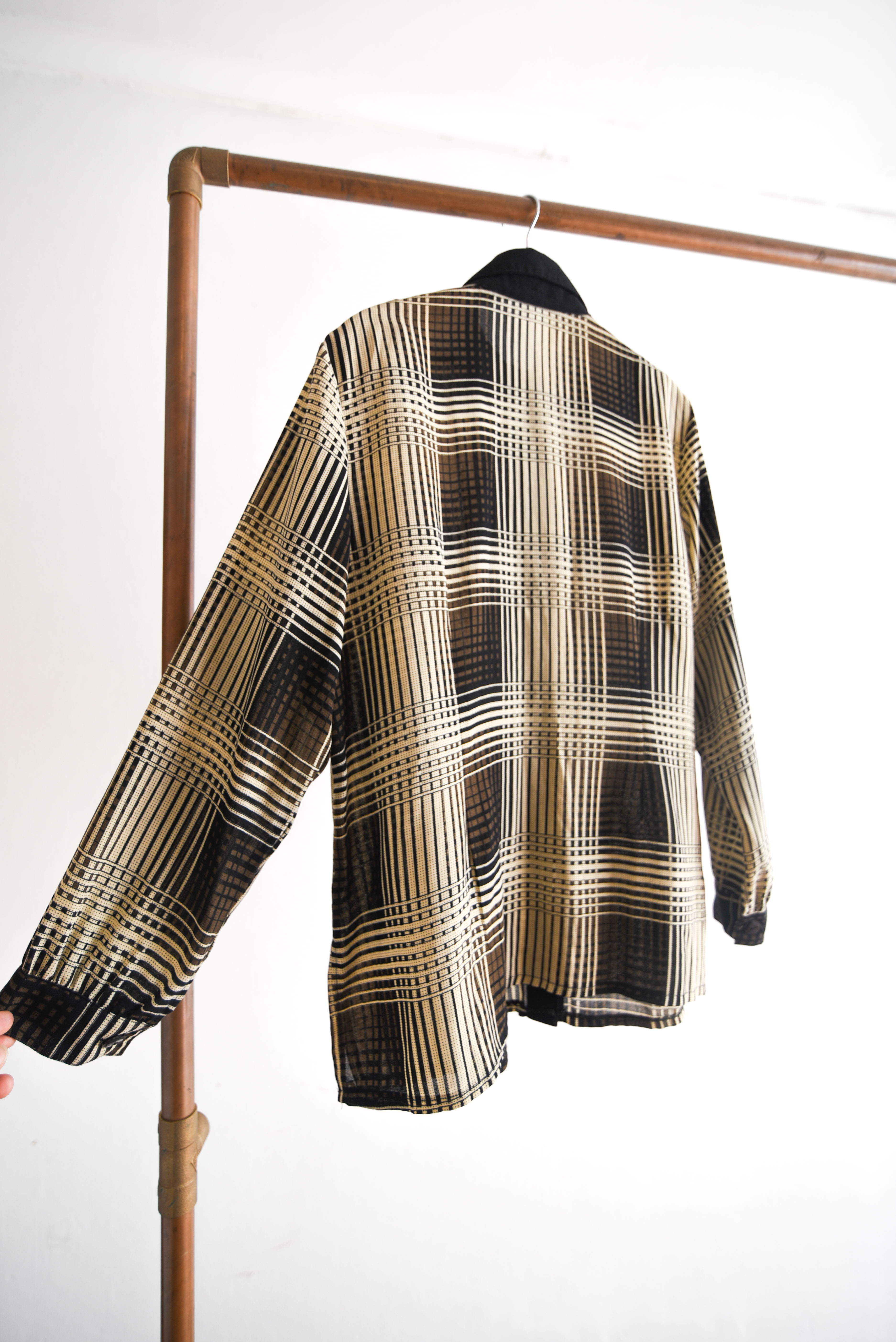 Blusa tartán café y negro