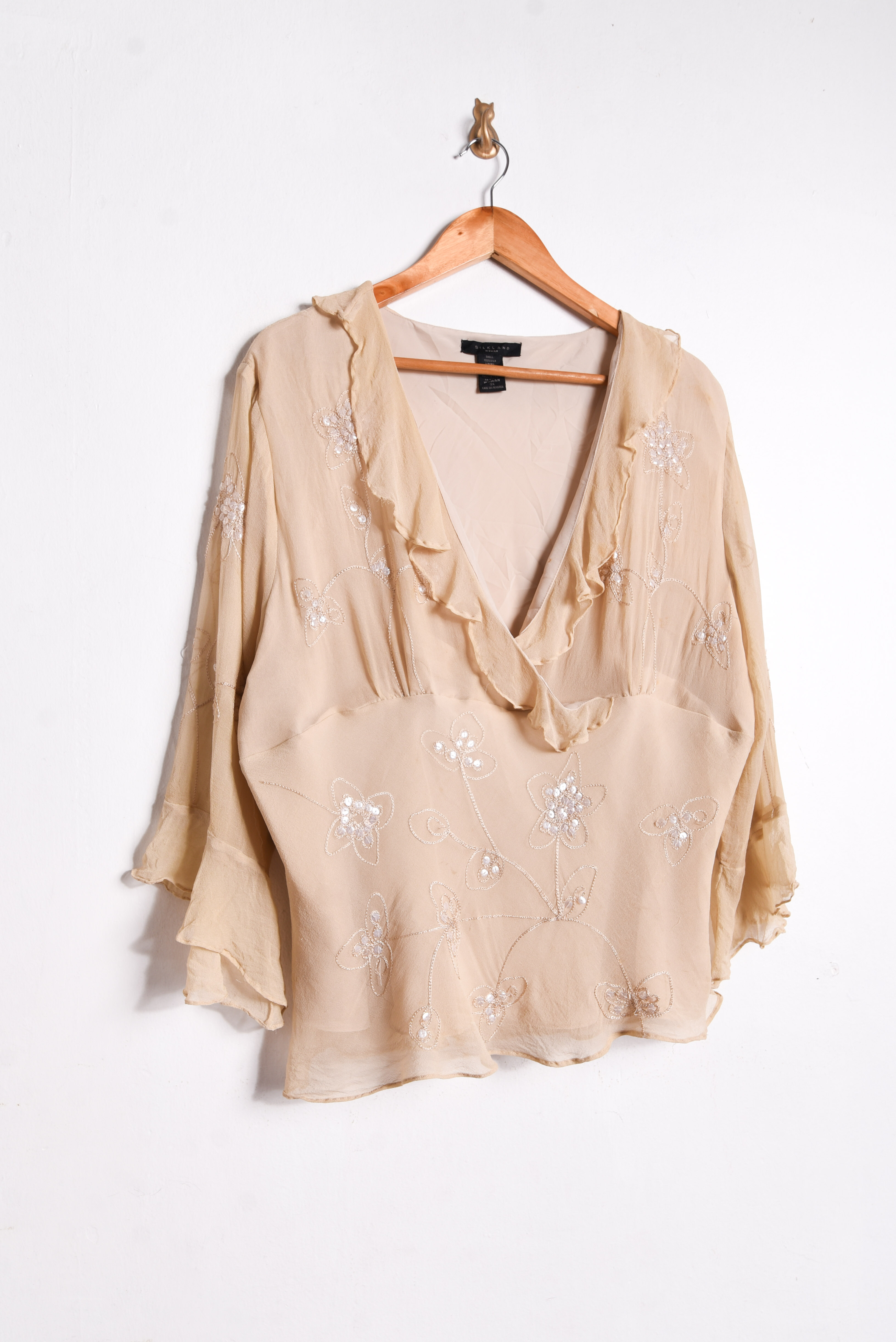 Blusa nude seda vuelos plus size
