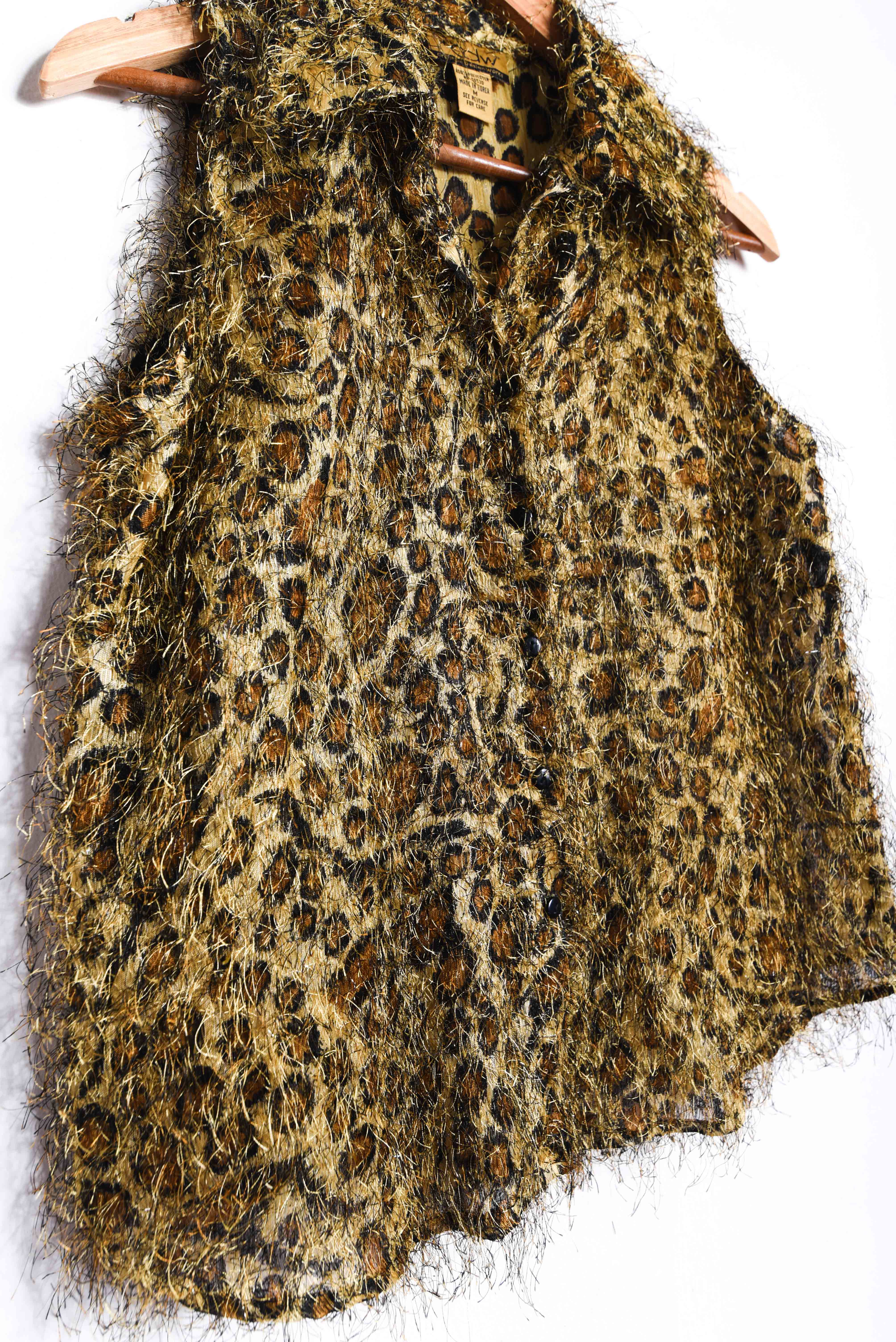 Blusa animal print furry