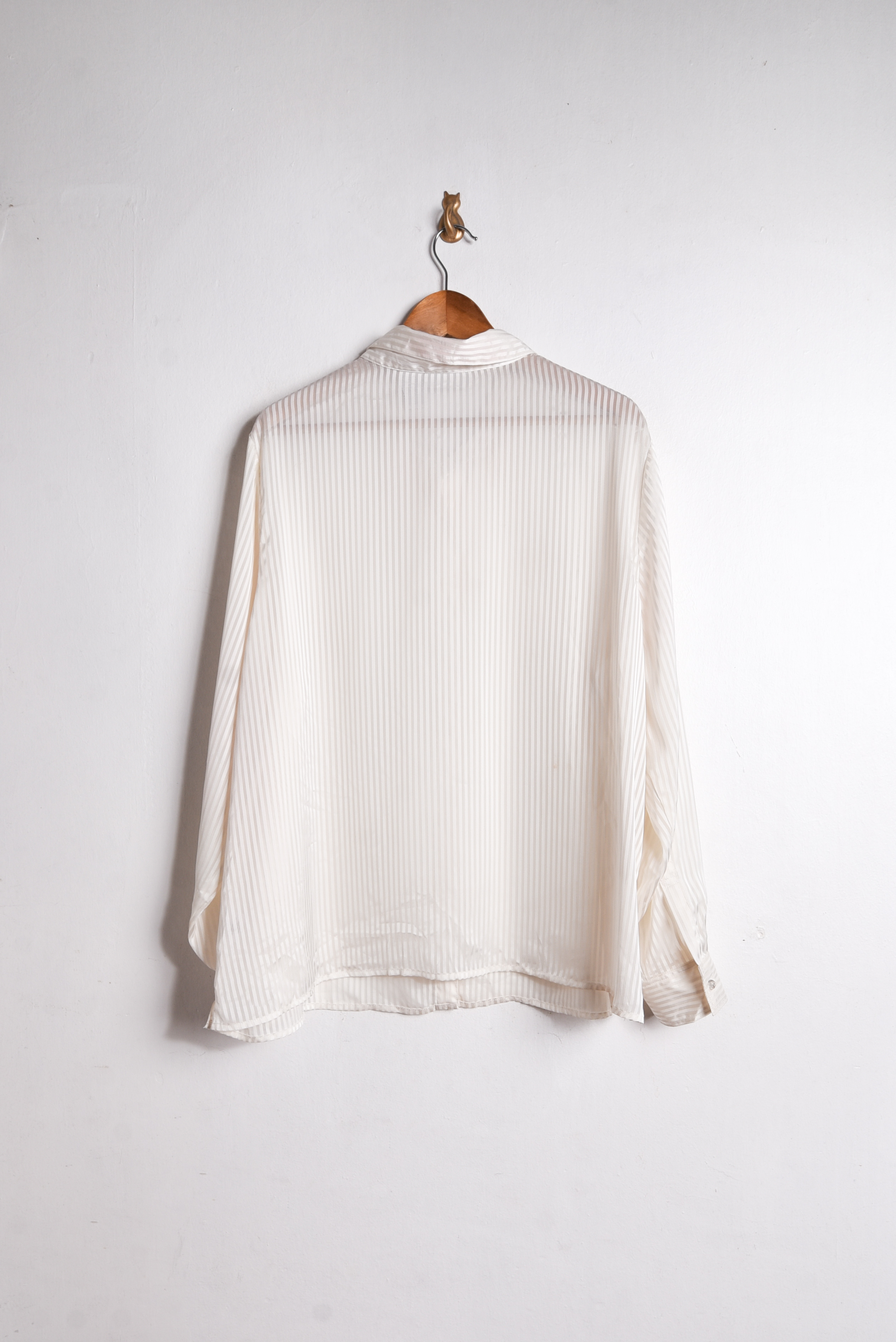 Blusa marfil rayada traslucida