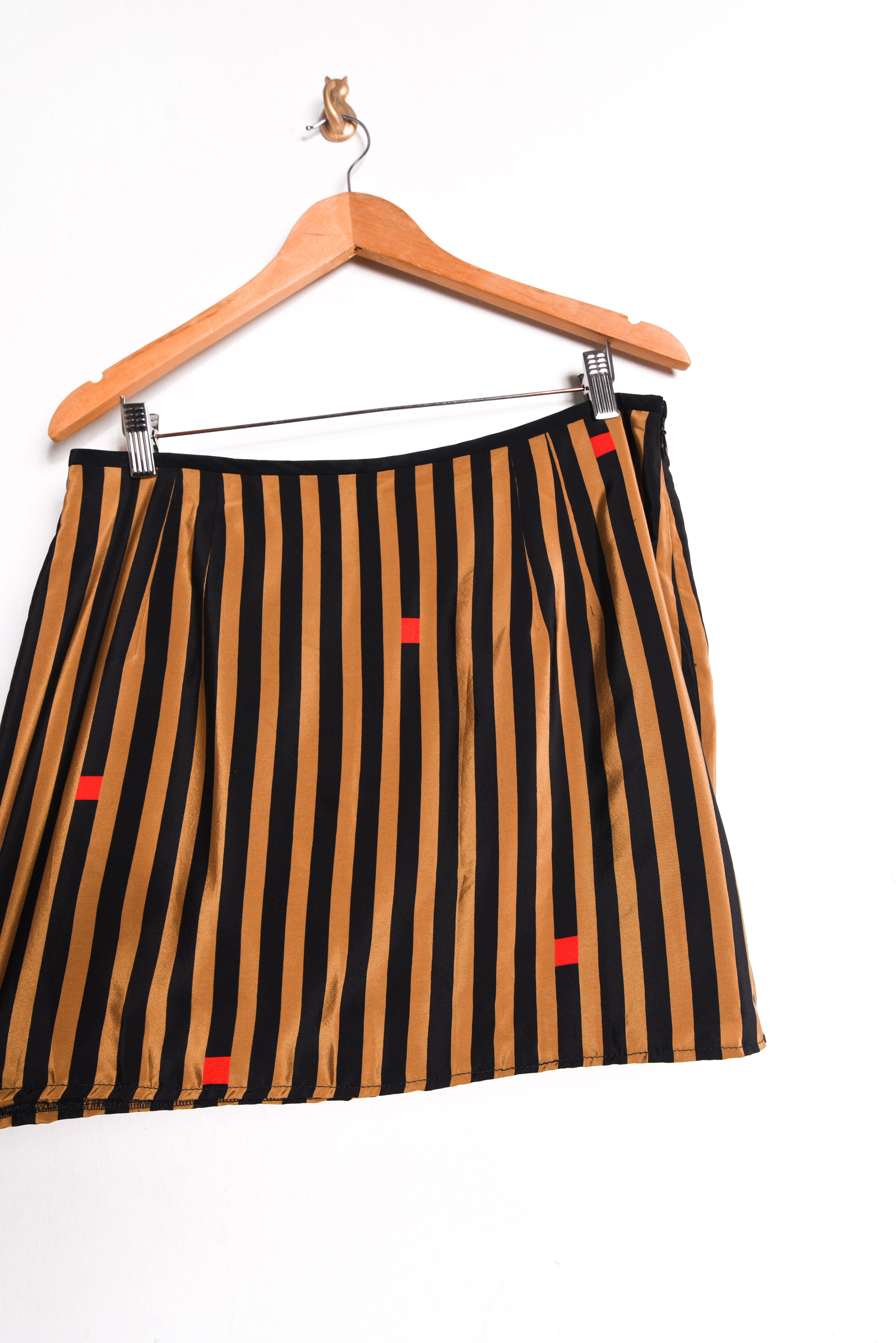 Mini falda camel rayada seda