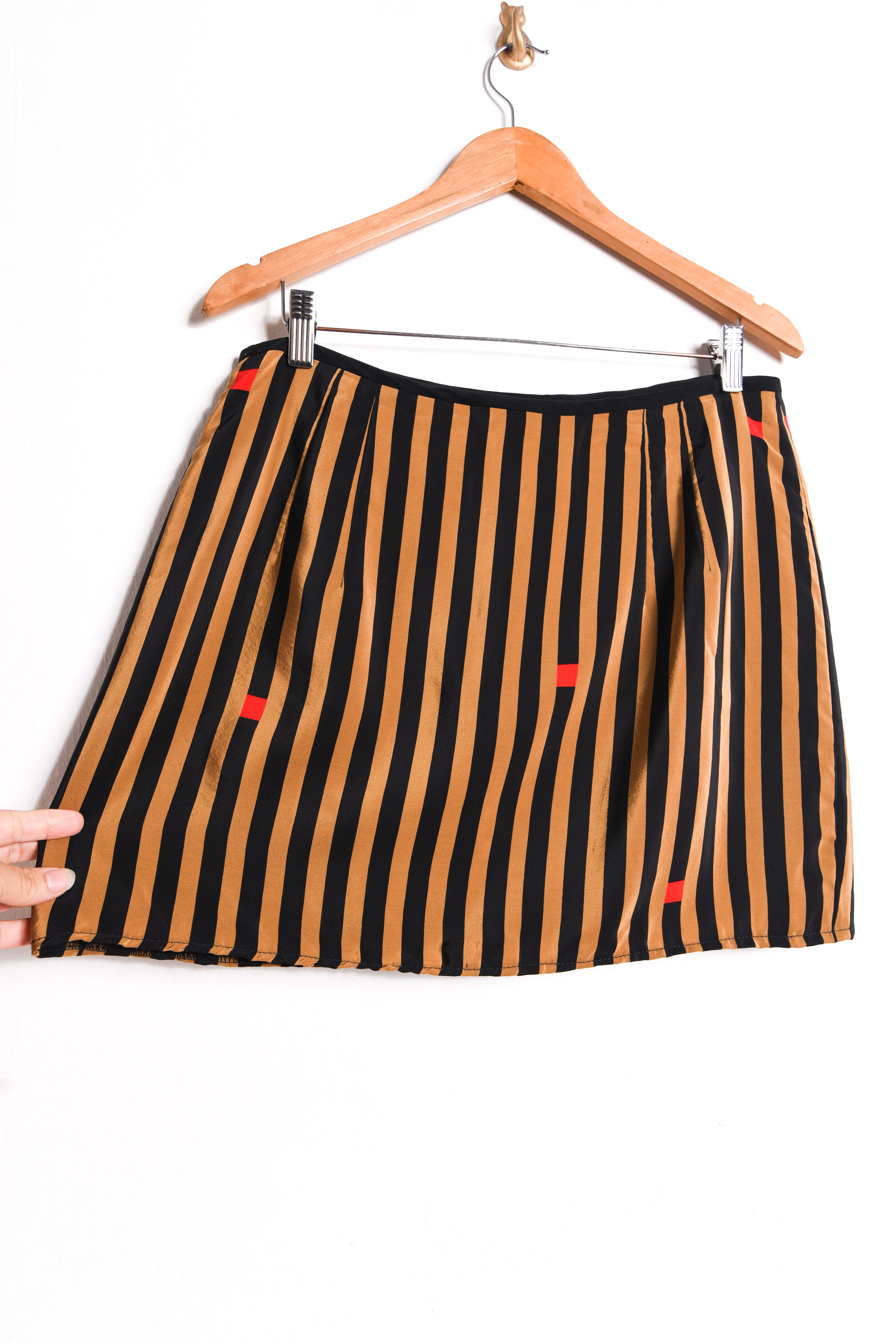 Mini falda camel rayada seda