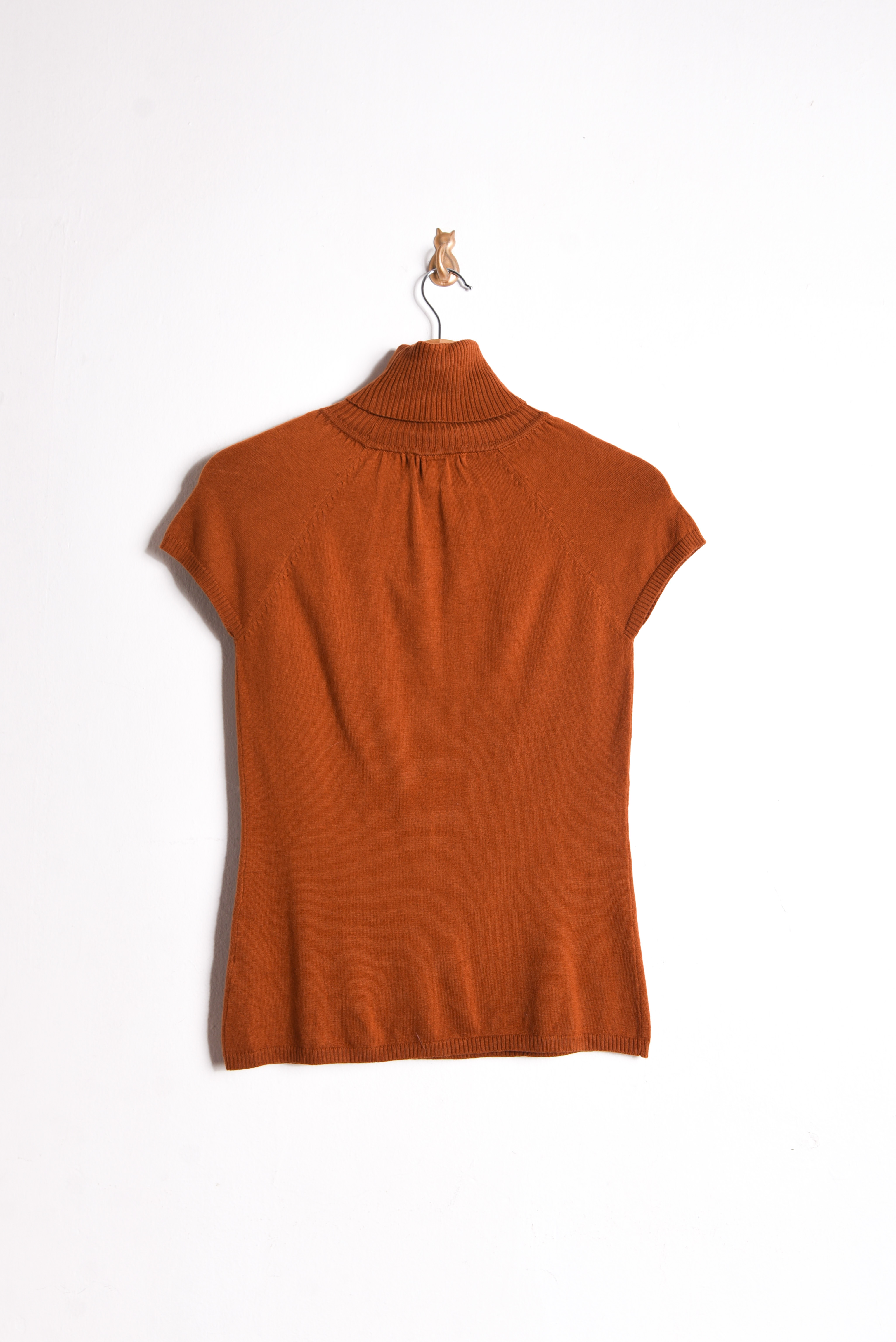 Top tejido naranjo cuello alto