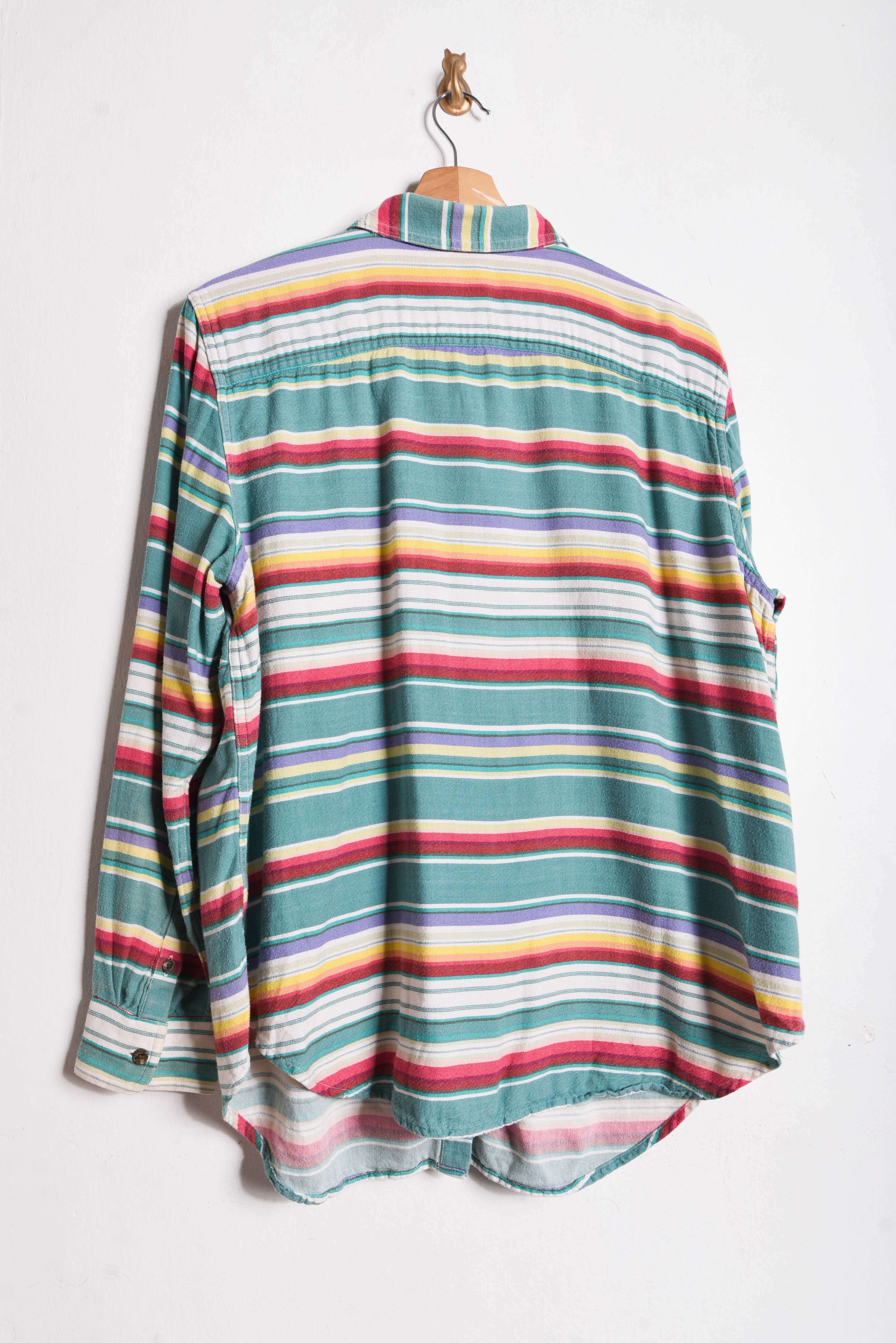 Camisa turquesa franjas
