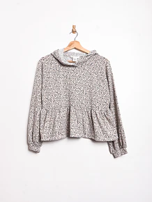 Polerón gris animal print vuelos