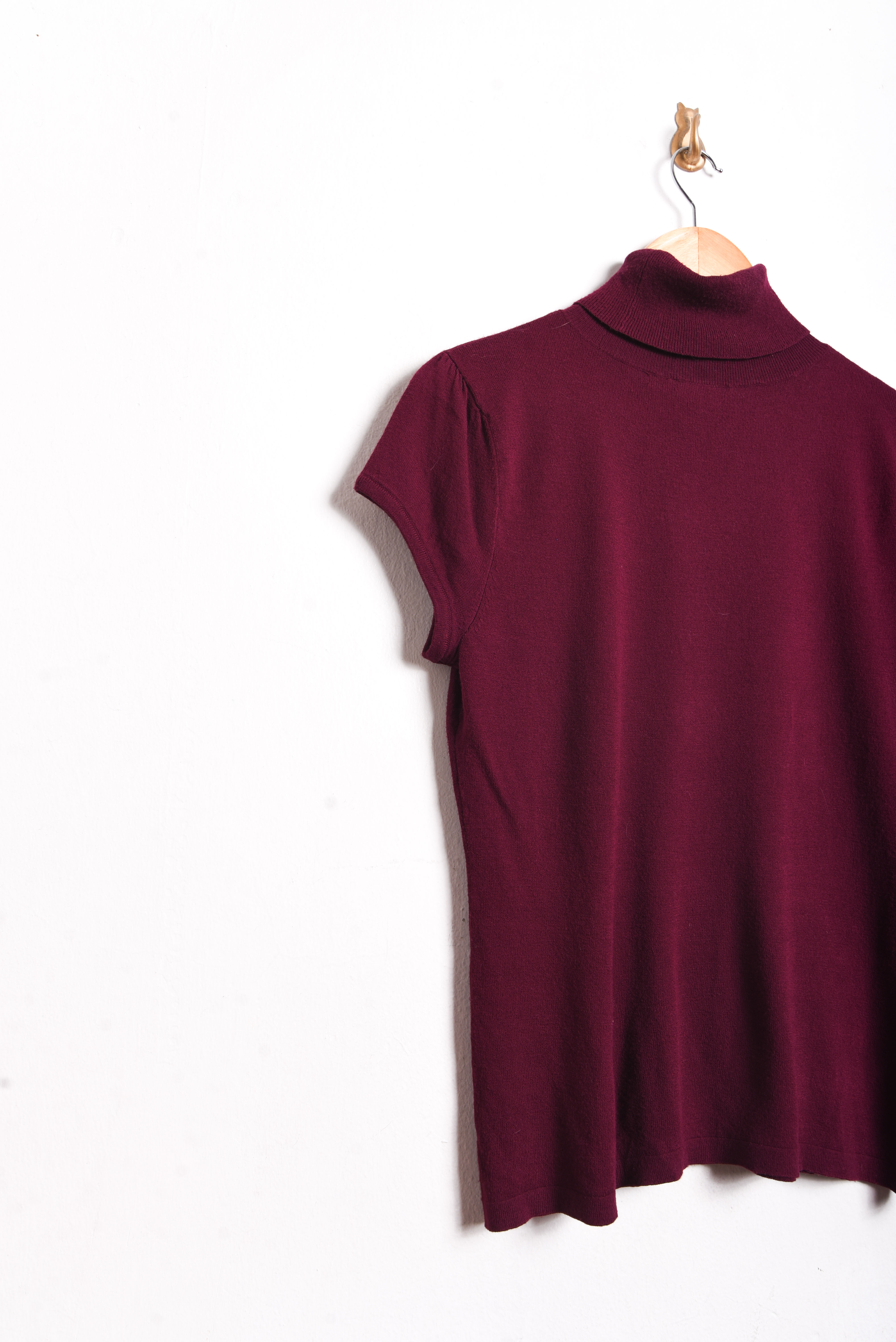 Top tejido burdeo cuello alto