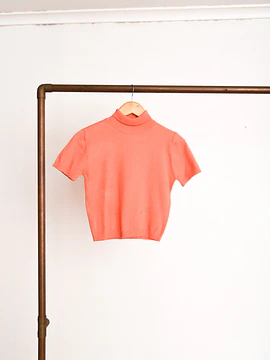 Top tejido naranjo cuello alto