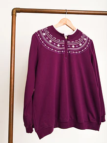 Polerón morado figuras