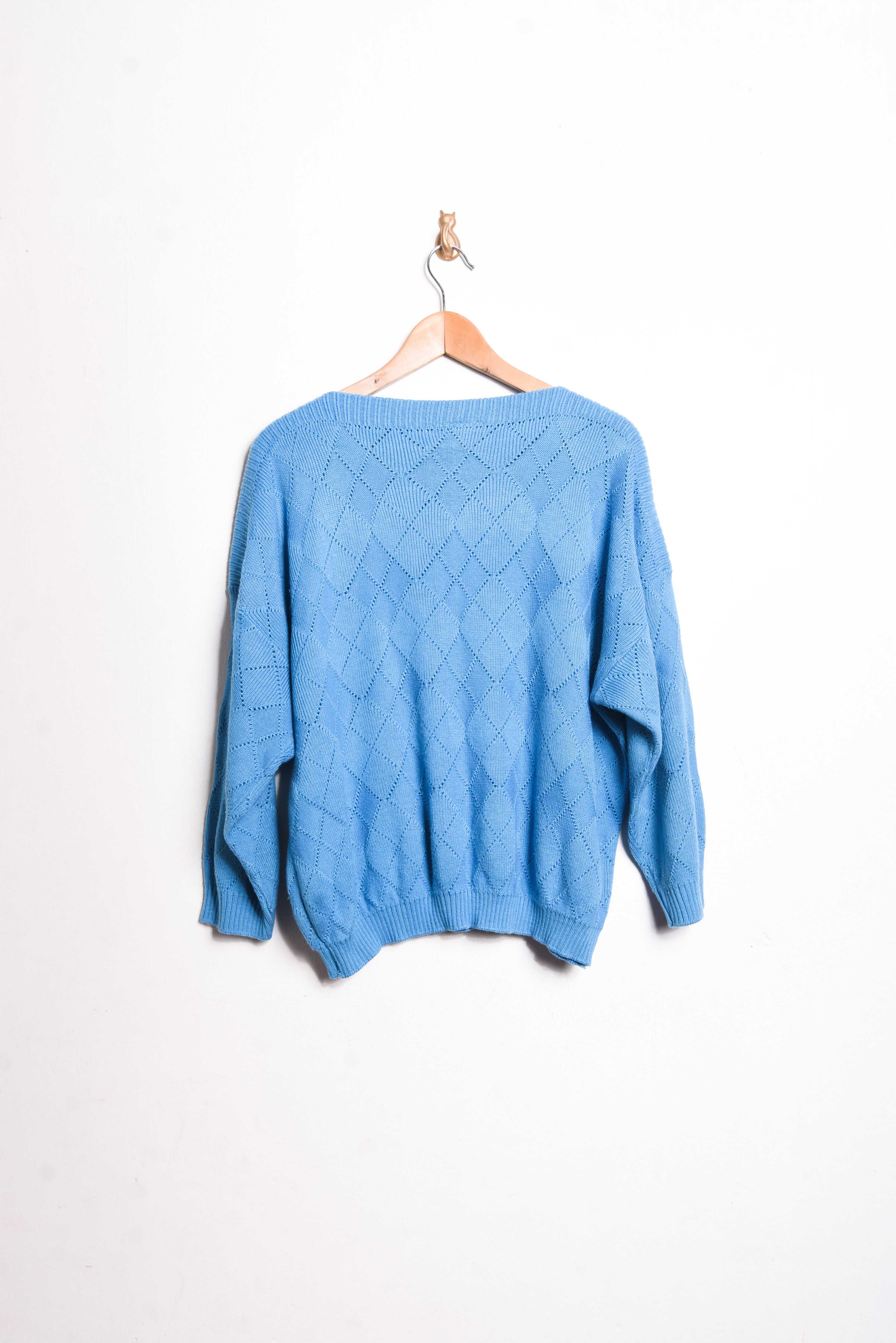 Chaleco celeste rombos vintage