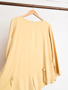 Blusa butter asimétrica