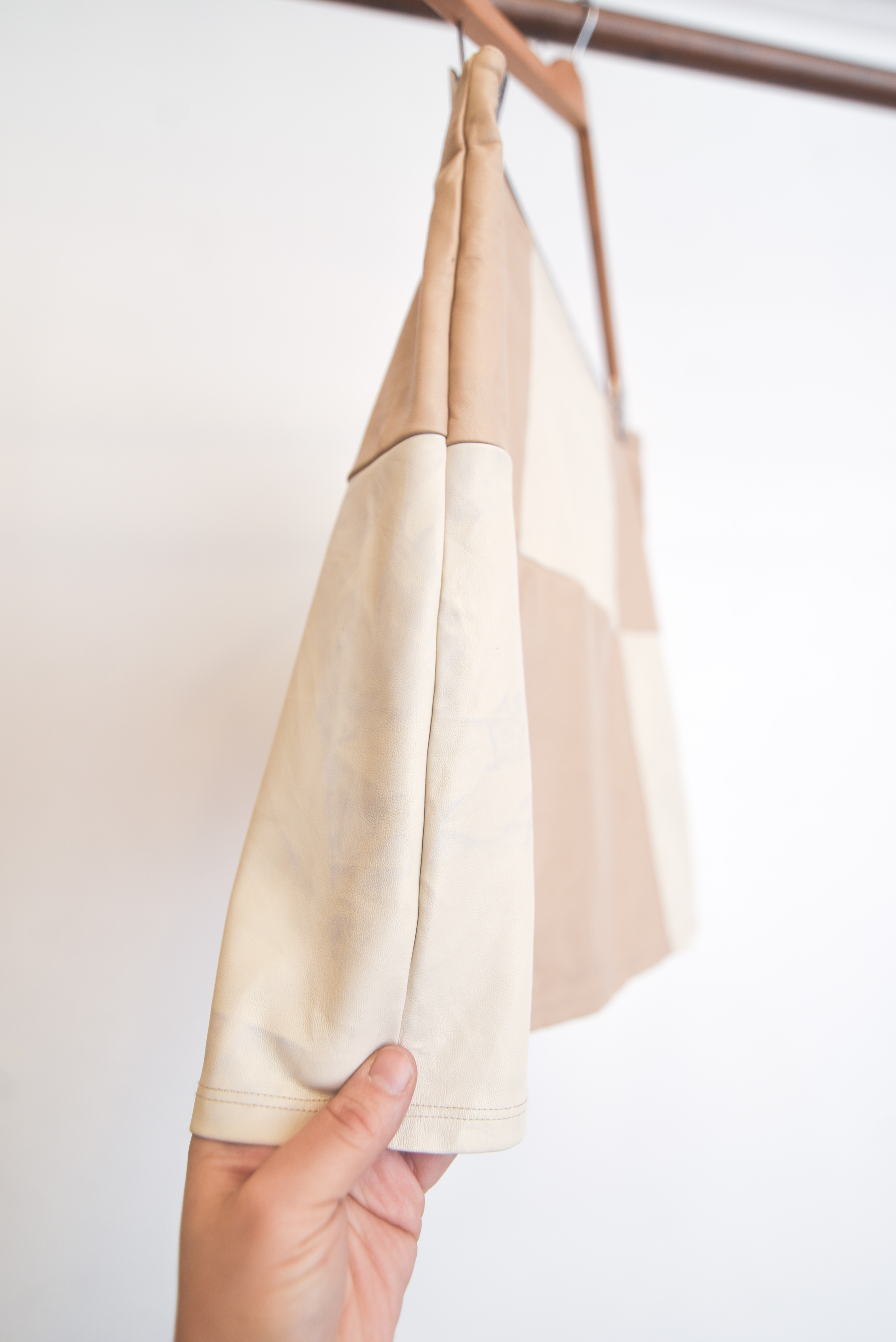 Falda eco cuero bicolor latte