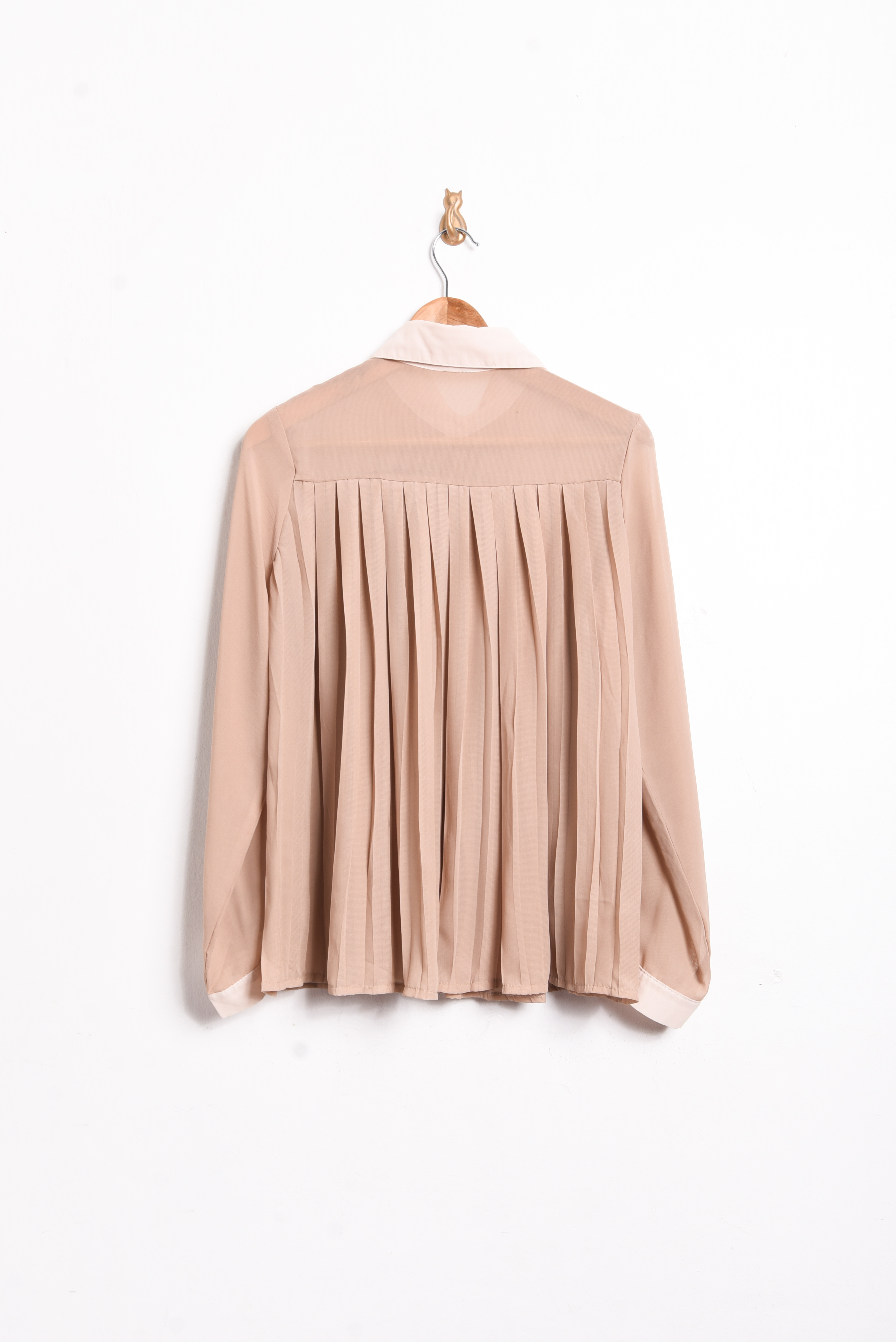Blusa plisada nude traslucida