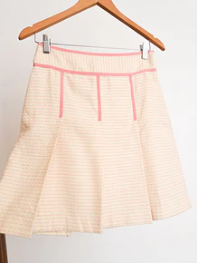 Falda marfil tablas coquette