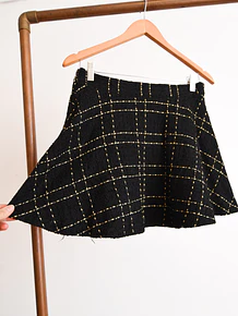 Mini falda tweed grilla