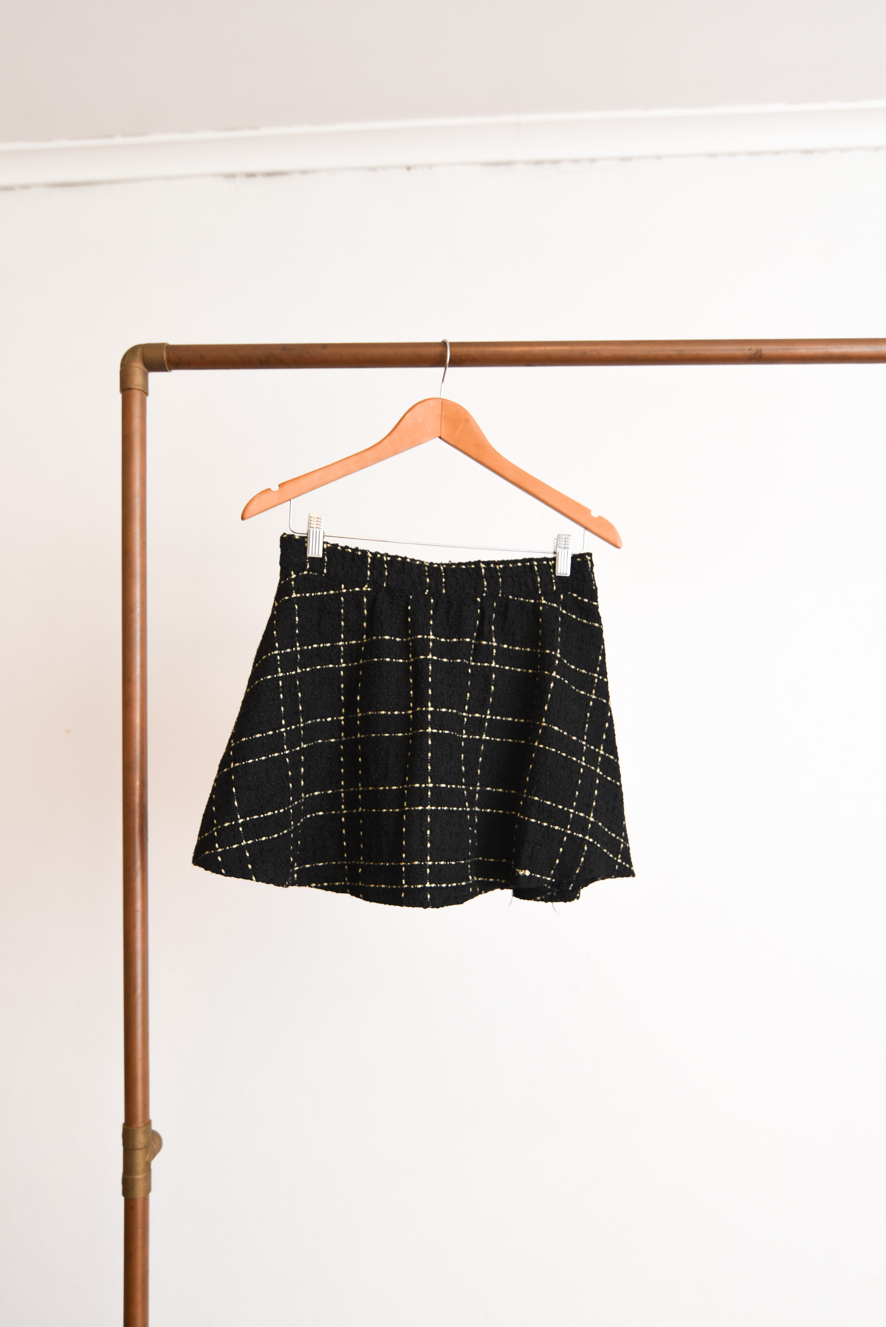 Mini falda tweed grilla