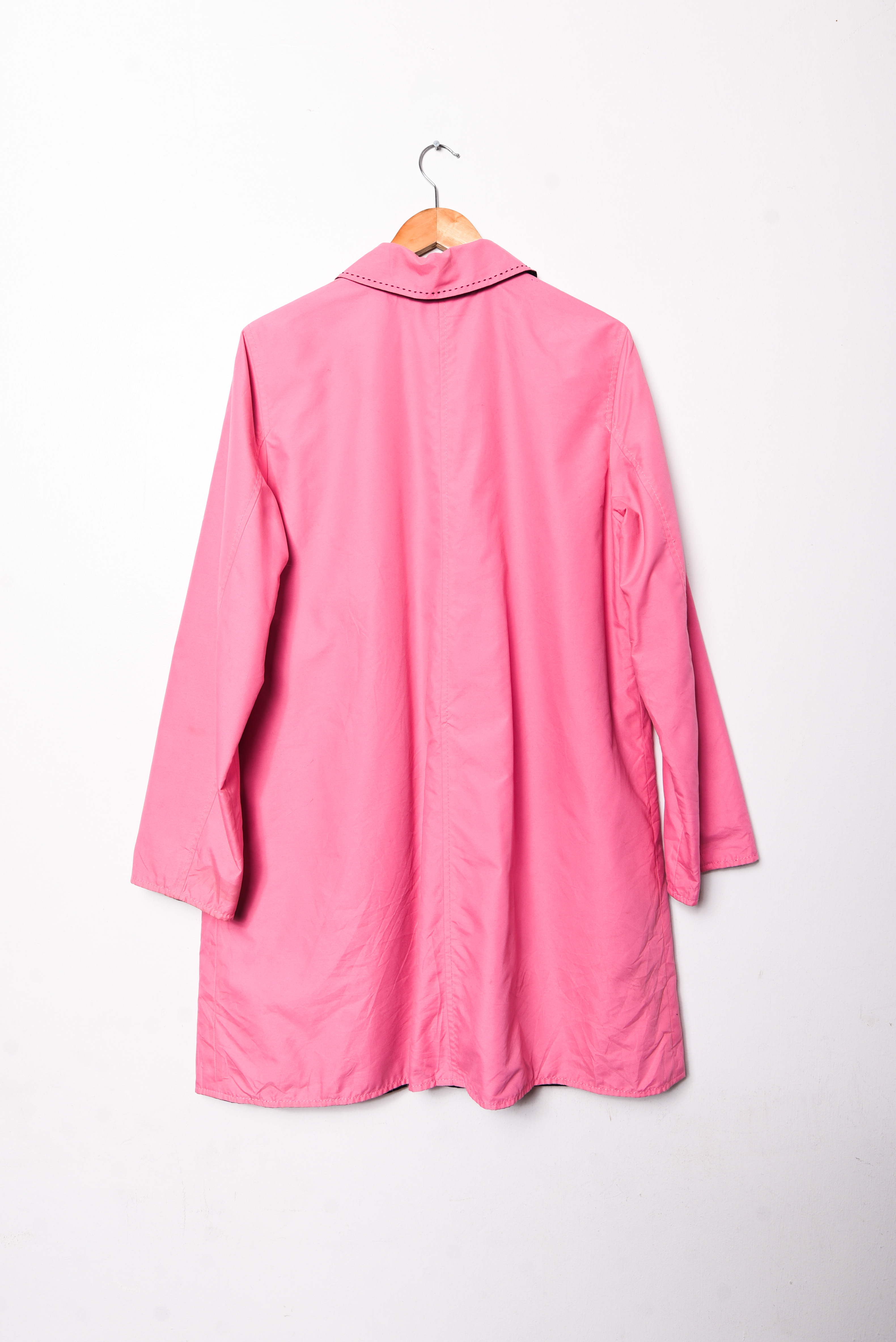 Trench rosa y negro reversible