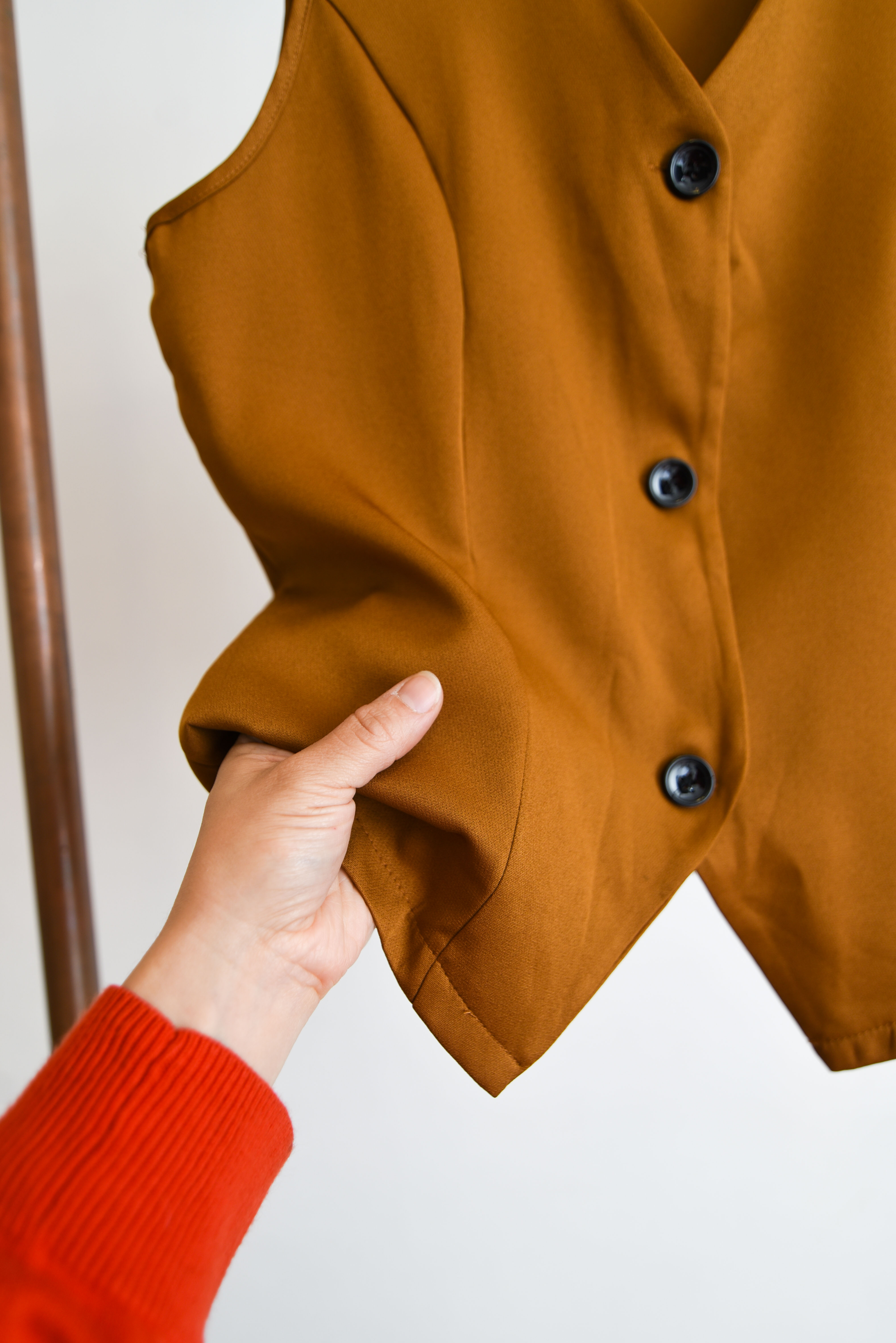 Vest camel botones