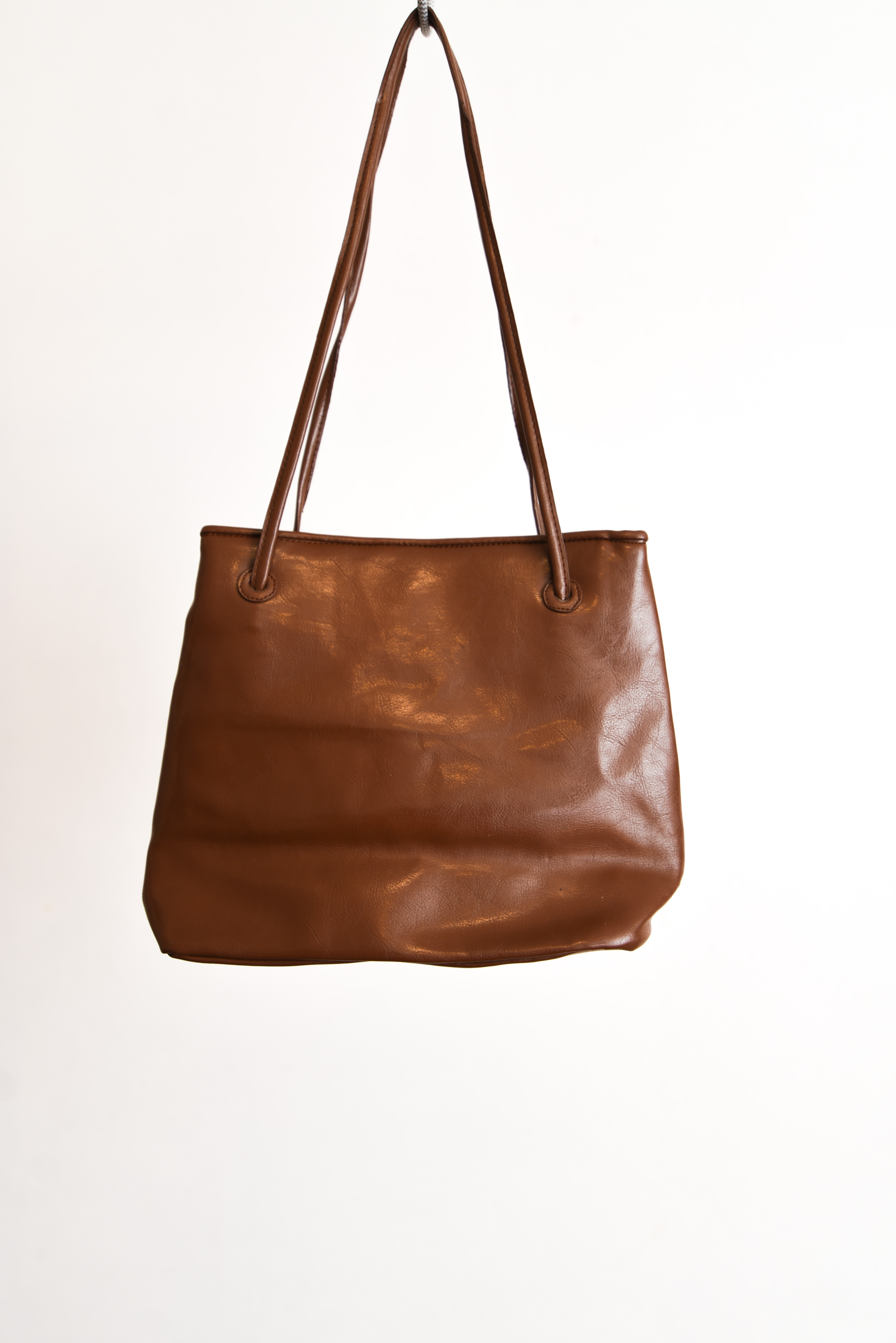 Cartera café entrelazada 90s