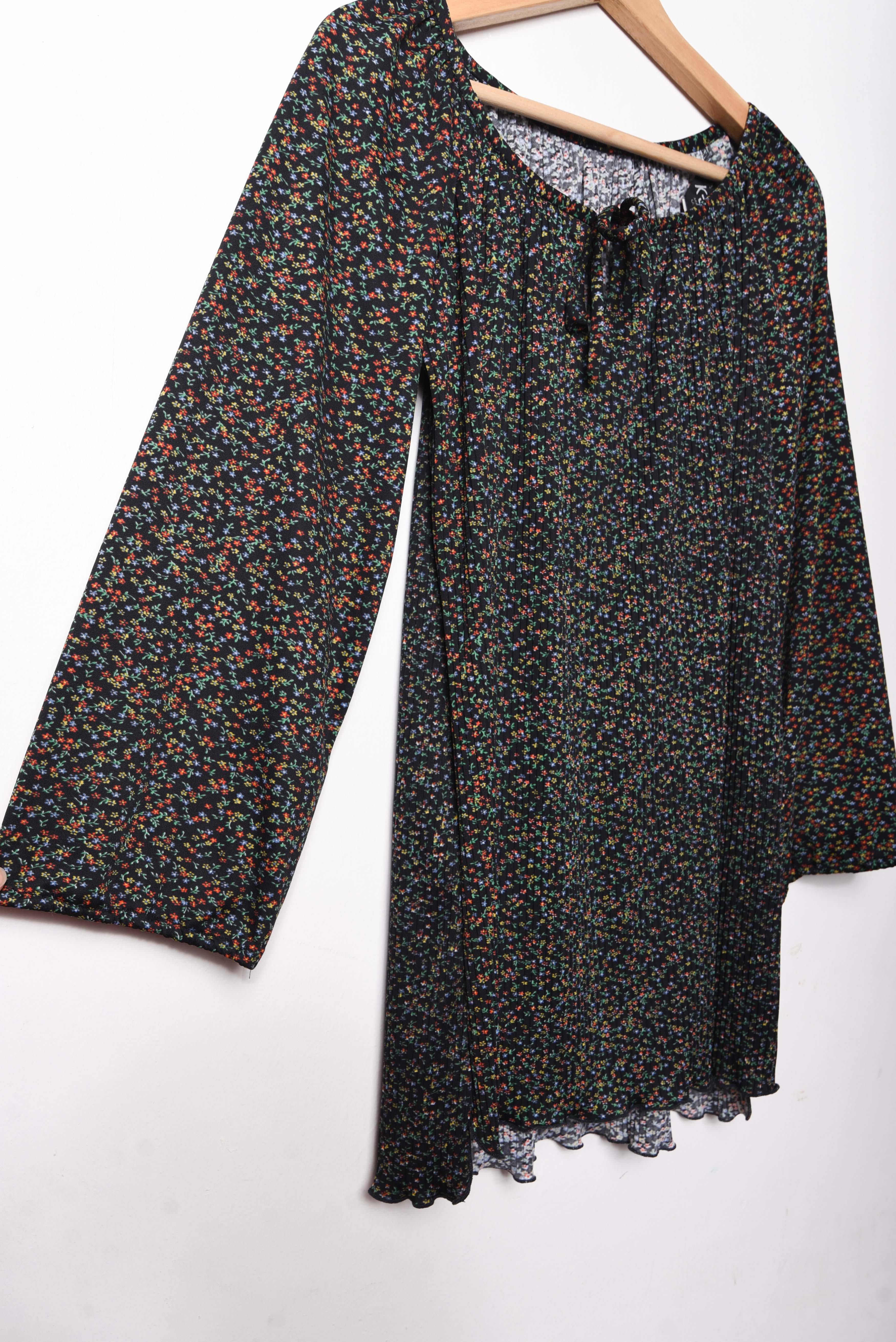 Blusa floral plisada 70s