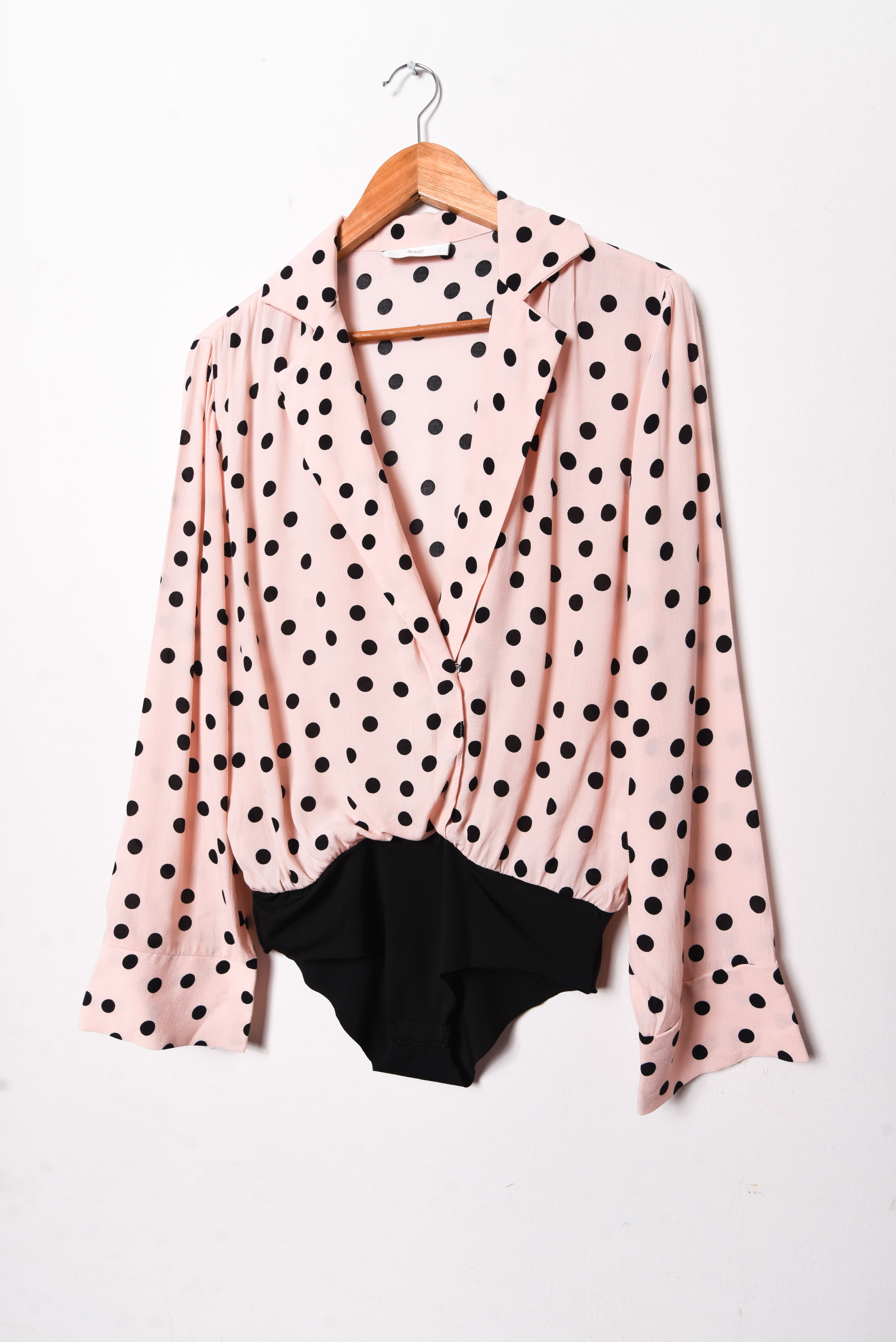 Body rosa pastel lunares