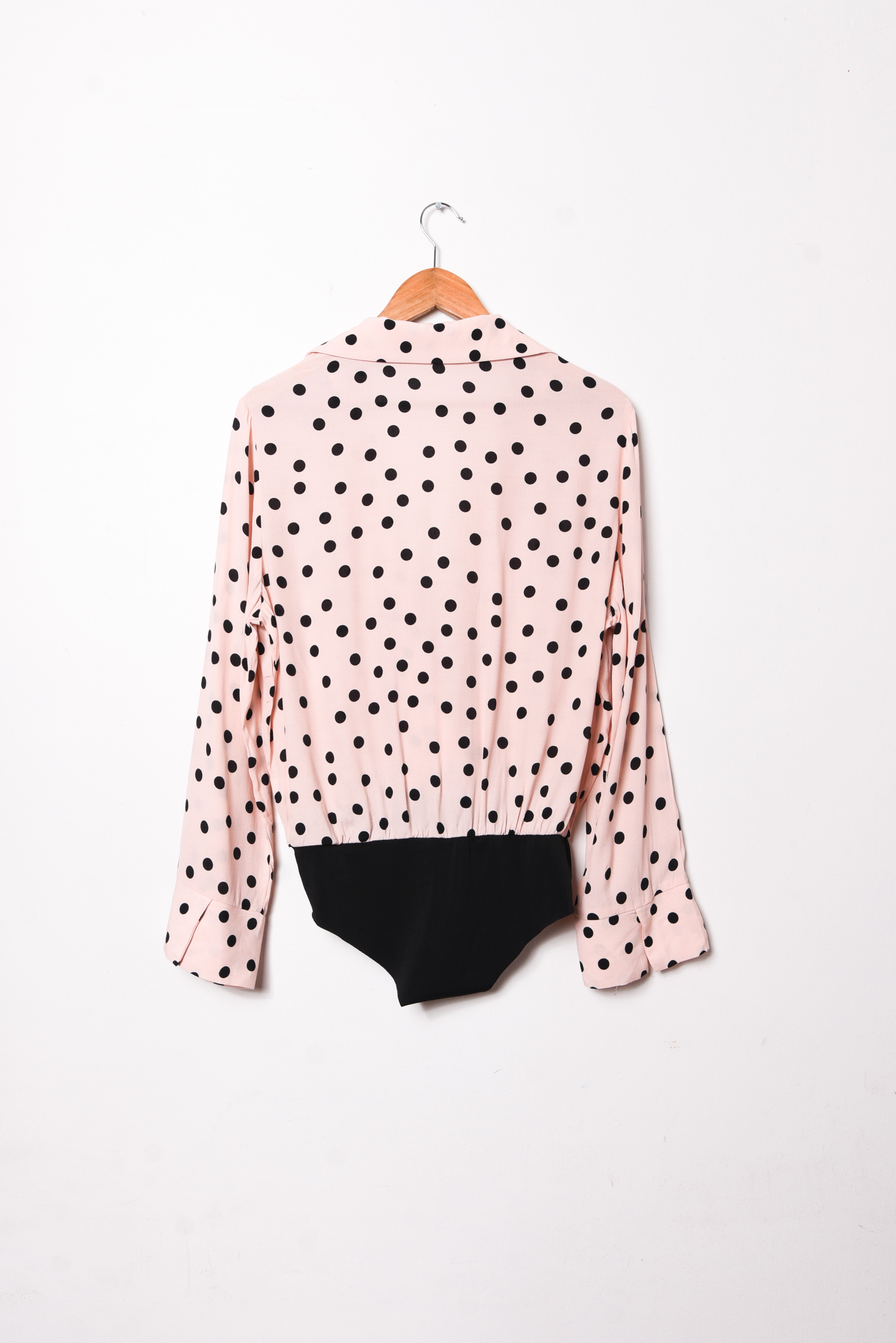 Body rosa pastel lunares