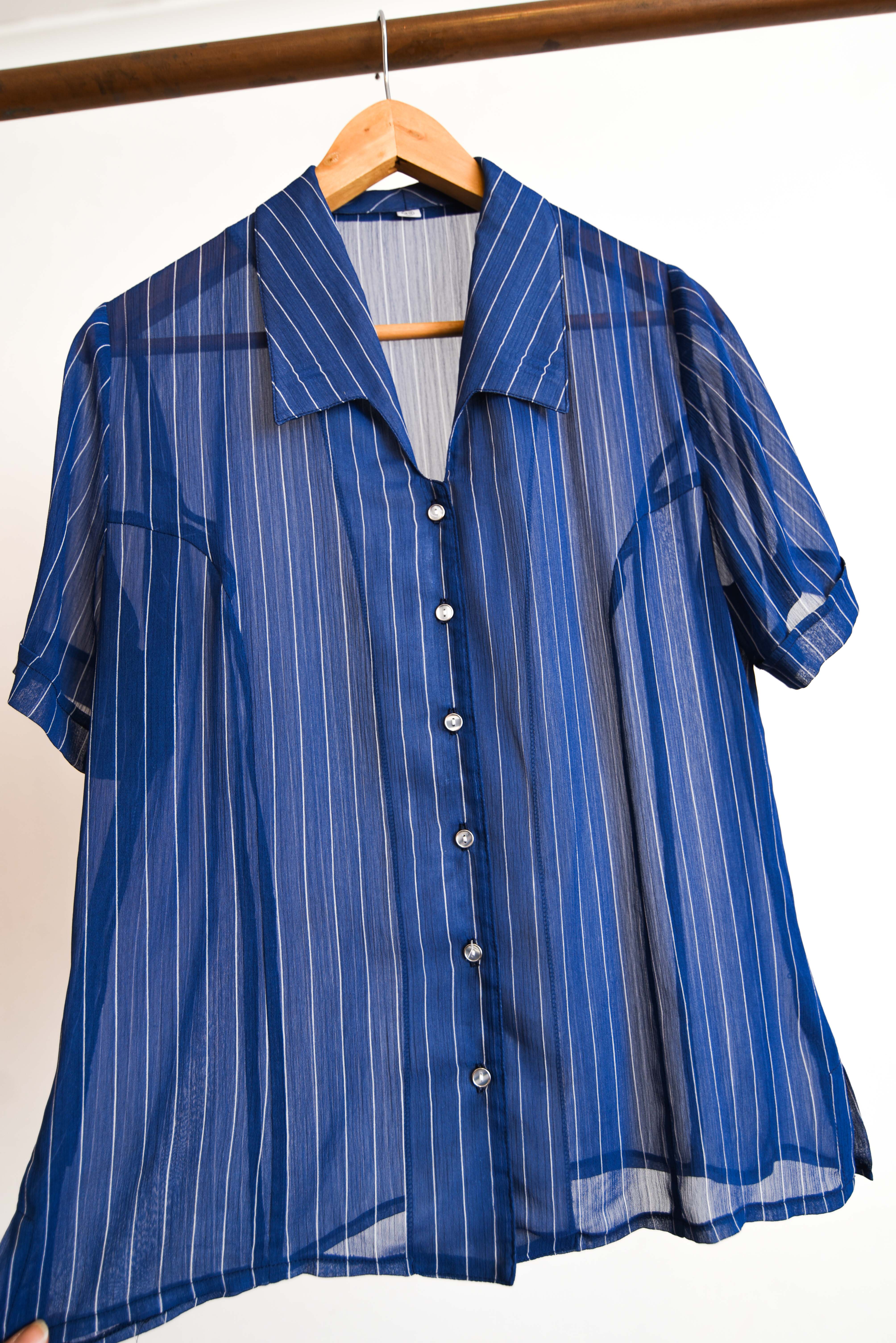 Blusa azul rayada transparencia