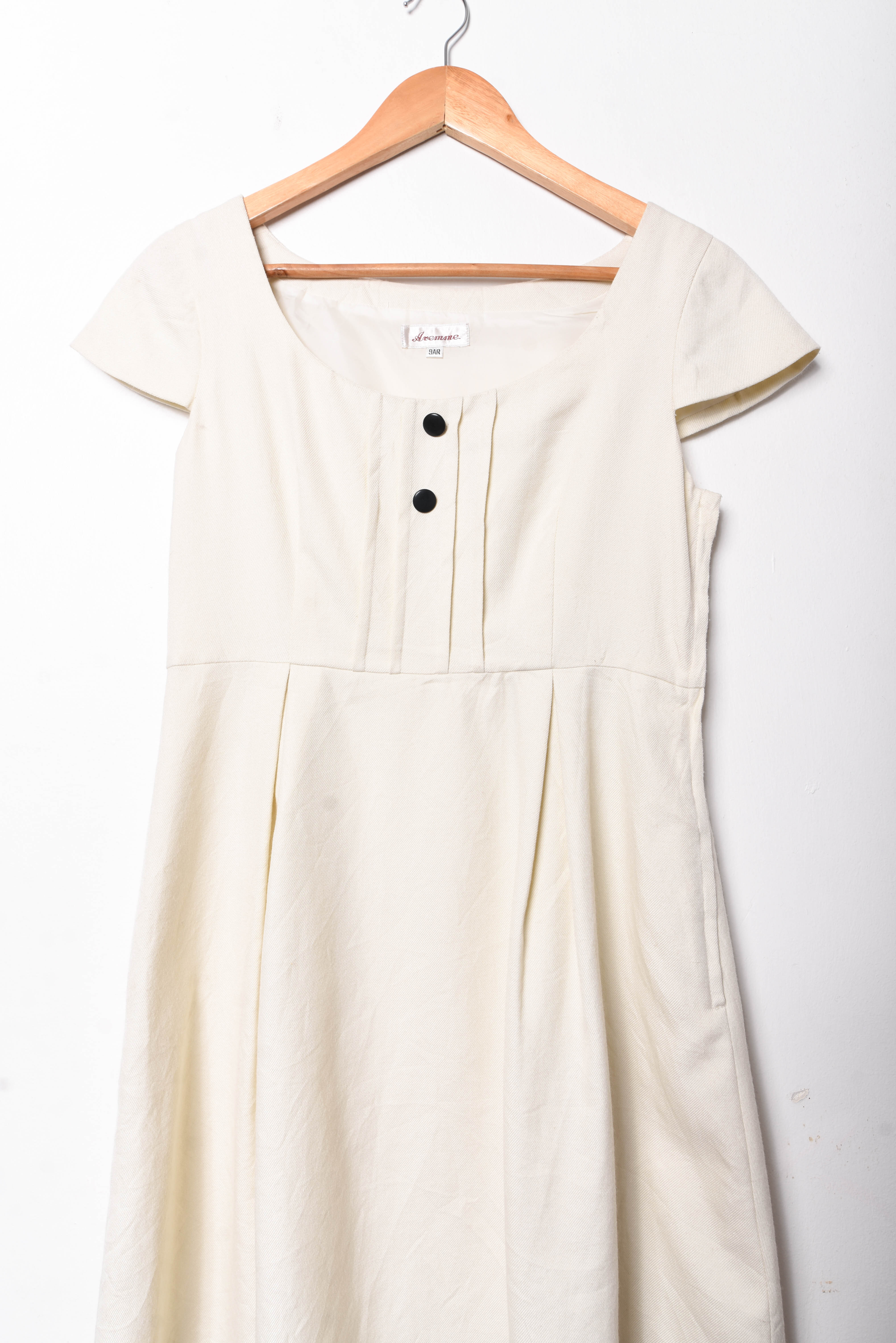 Vestido marfil botones 