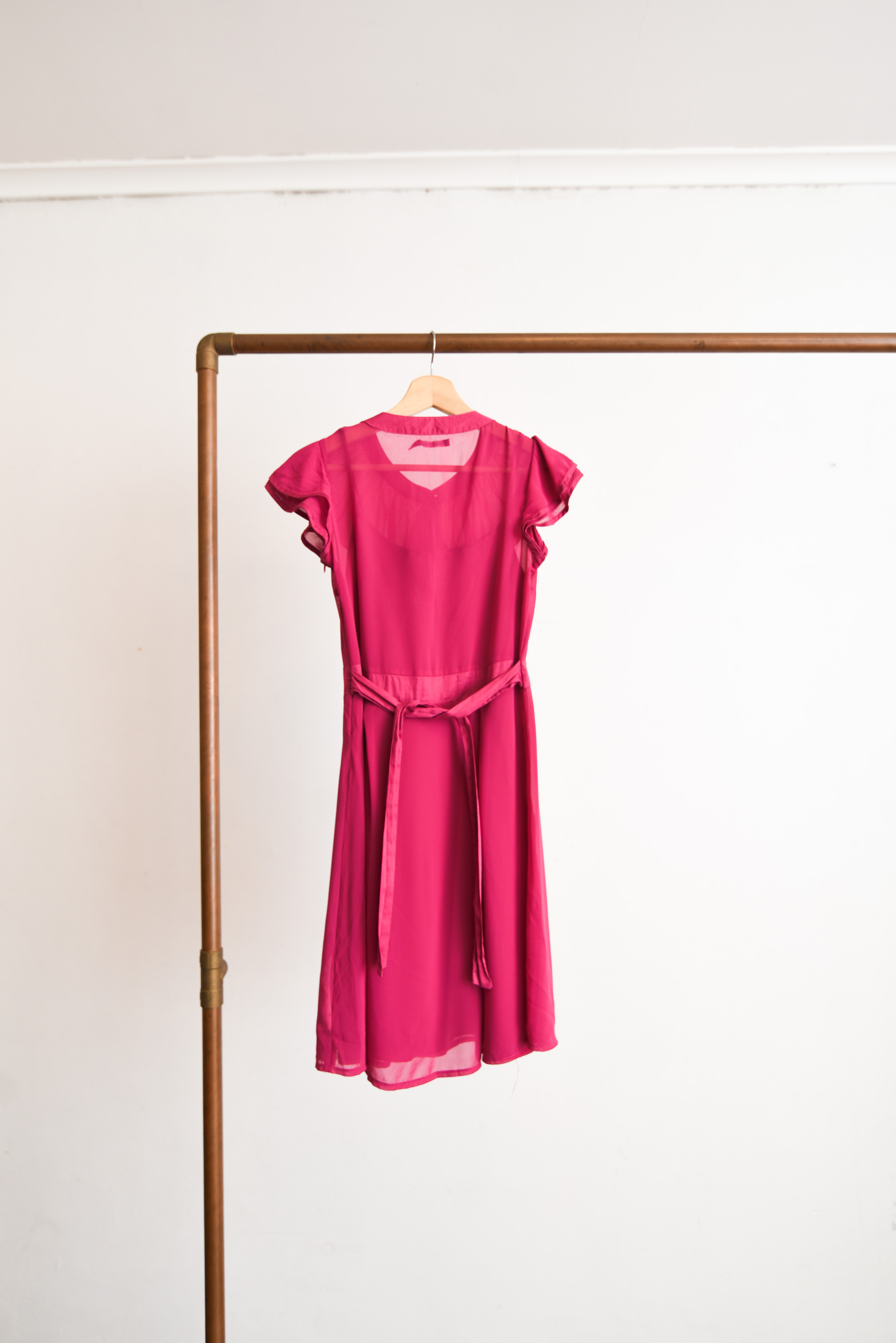 Vestido fucsia vuelos