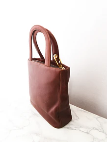 Cartera de mano café cuero vintage